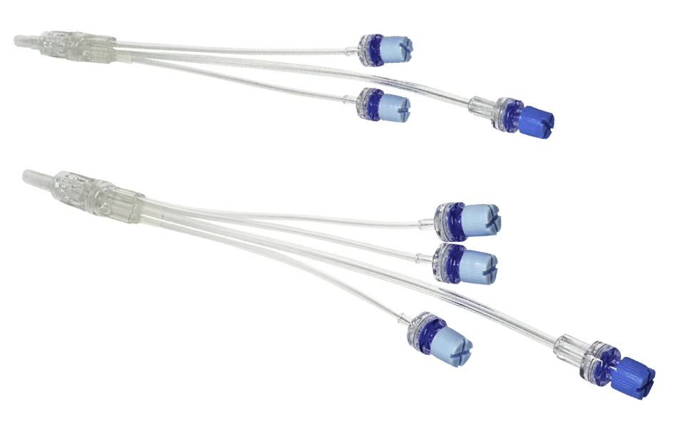 Multiple molecular biology pipette tips with blue and clear caps, arranged in a scattered manner against a black background.