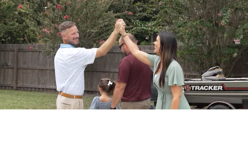 Customer high fiving the owner after a job well done.