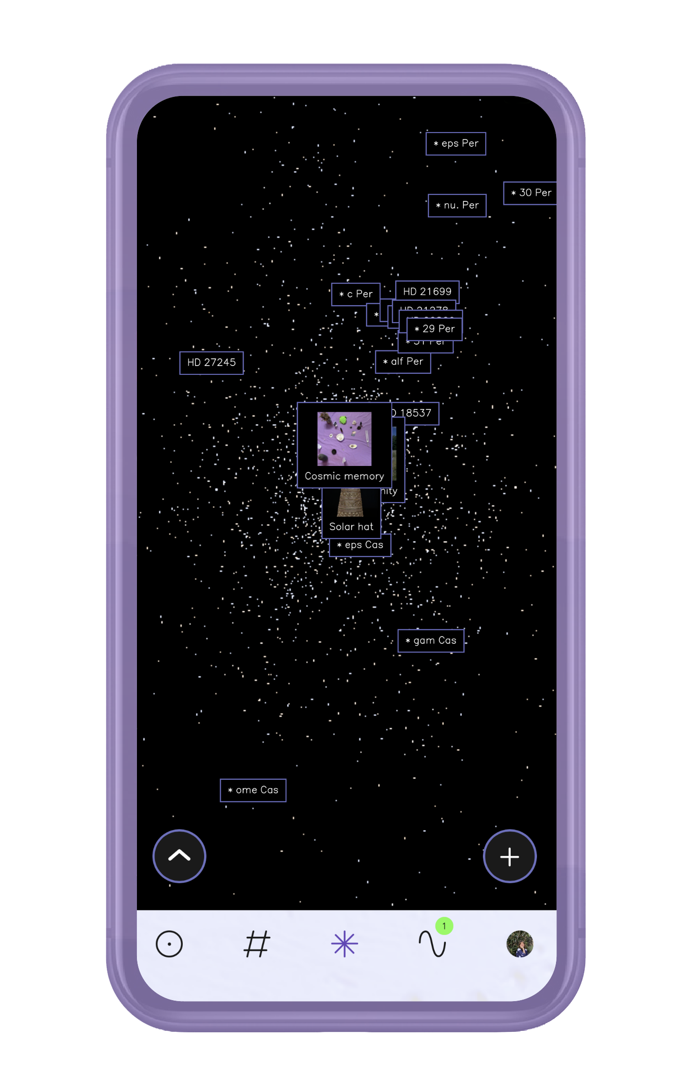 A smartphone screen displays a star map with labels for various stars and constellations, including 'Cosmic memory,' 'Solar hat,' and several star designations like 'HD 27245' and '29 Per.' The app interface shows navigation buttons at the bottom, plus and minus icons.