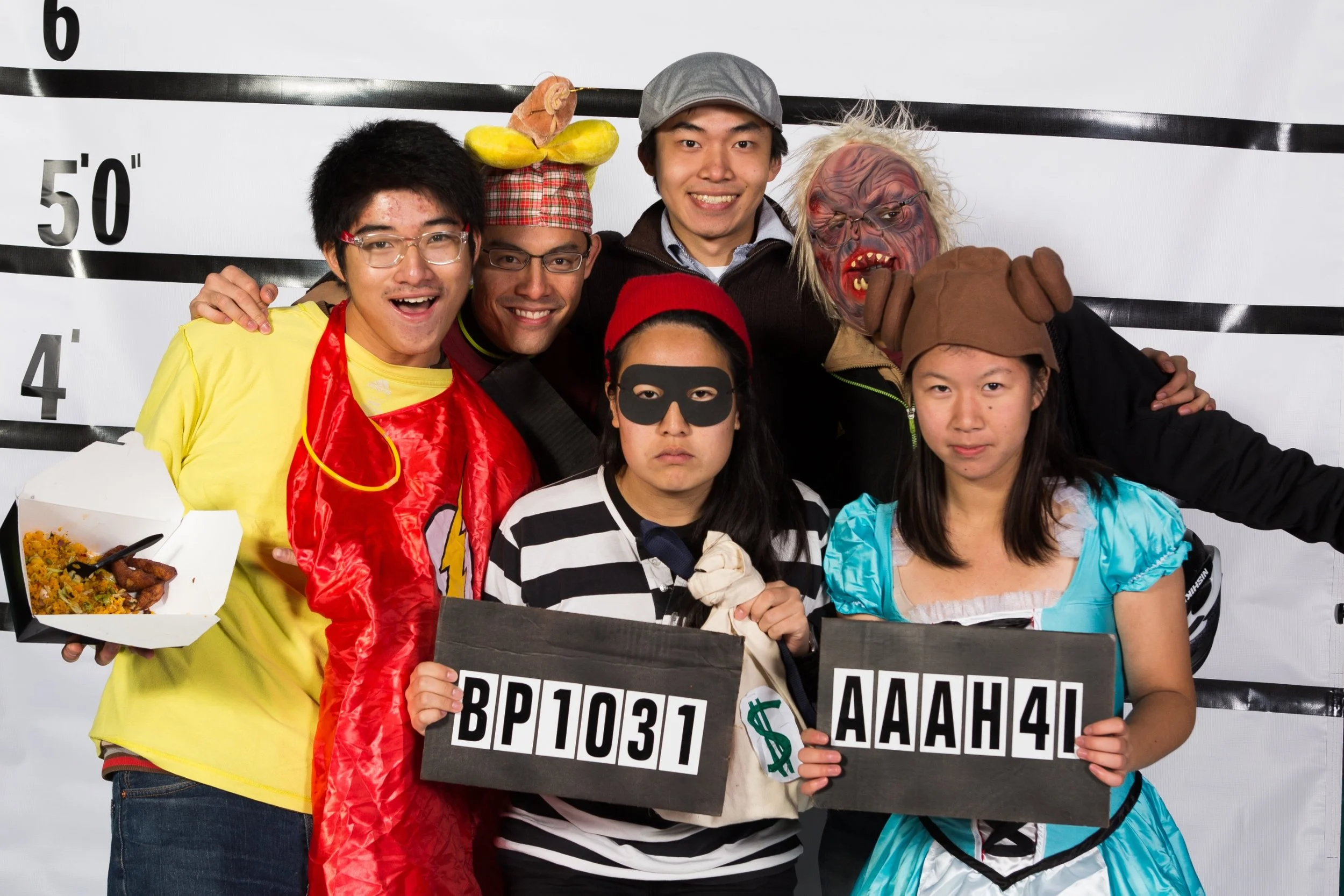 Group of people dressed as inmates