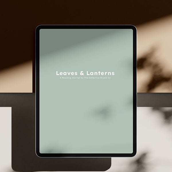 a tablet  displaying the cover of 'Leaves & Lanterns,' a reading journal by The Collective Studio Co.