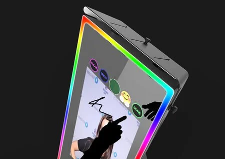 Close-up of a smartphone with a color-changing border, showing a stylus and a person drawing on the screen.