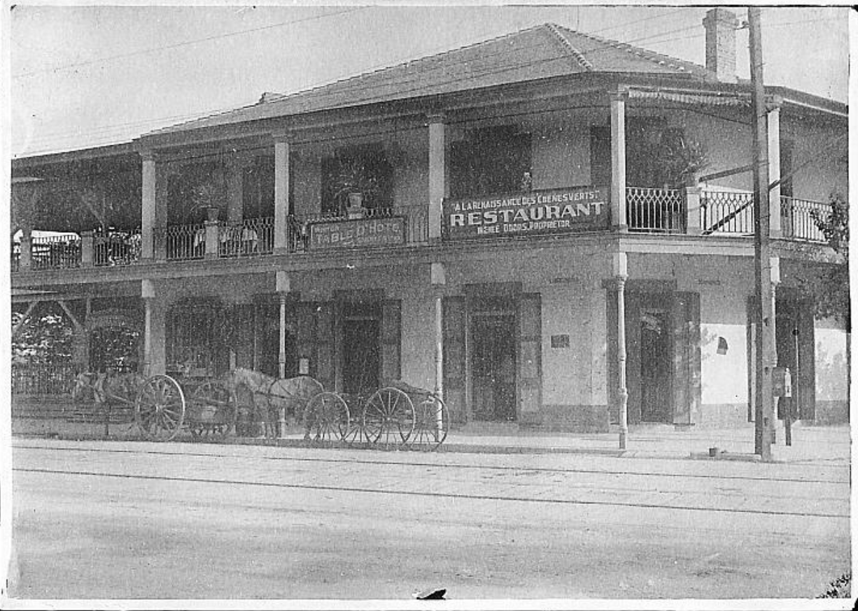 A black-and-white photograph of Ralph's on the Park in 1893, when it was "A La Renaissance des Chenes Verts" or "Rebirth of the Green Oaks"..