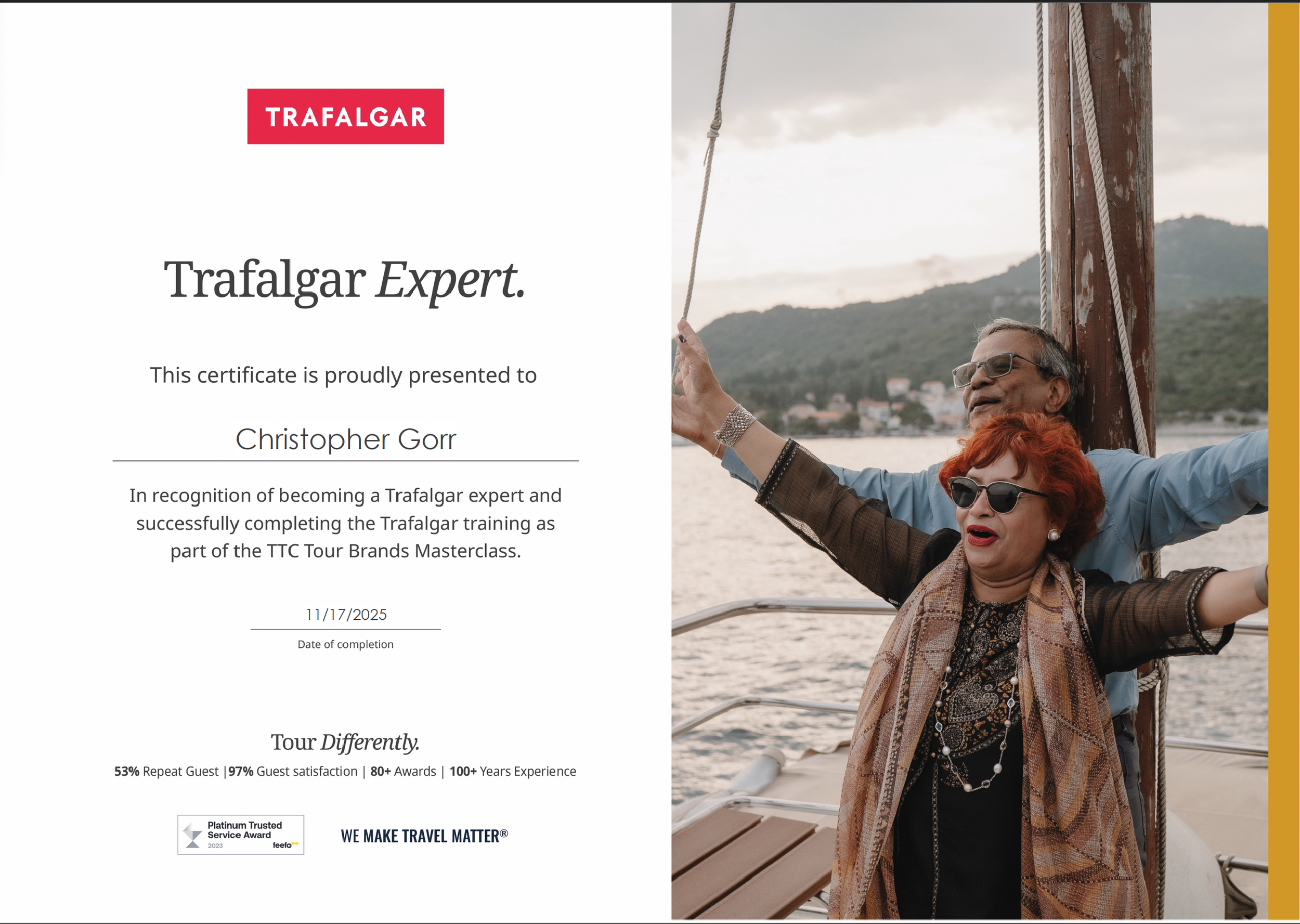 A certificate with the title "Trafalgar Expert" presented to Christopher Gorr, celebrating his completion of Trafalgar training. The certificate is displayed on the left, and on the right, a photo of an elderly couple on a boat, smiling and enjoying the water with a scenic landscape of hills in the background.