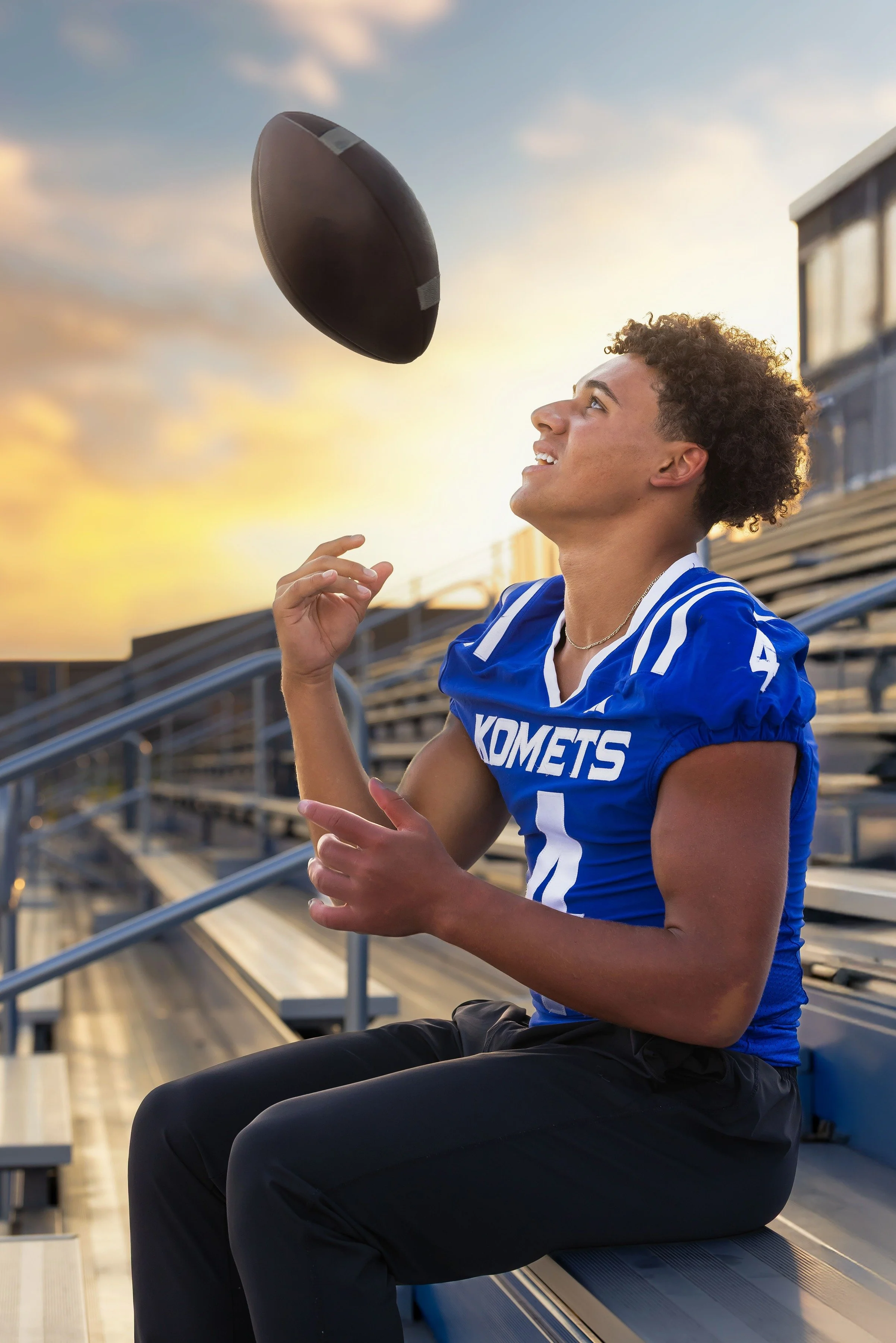senior portrait of a football player in rochester mn