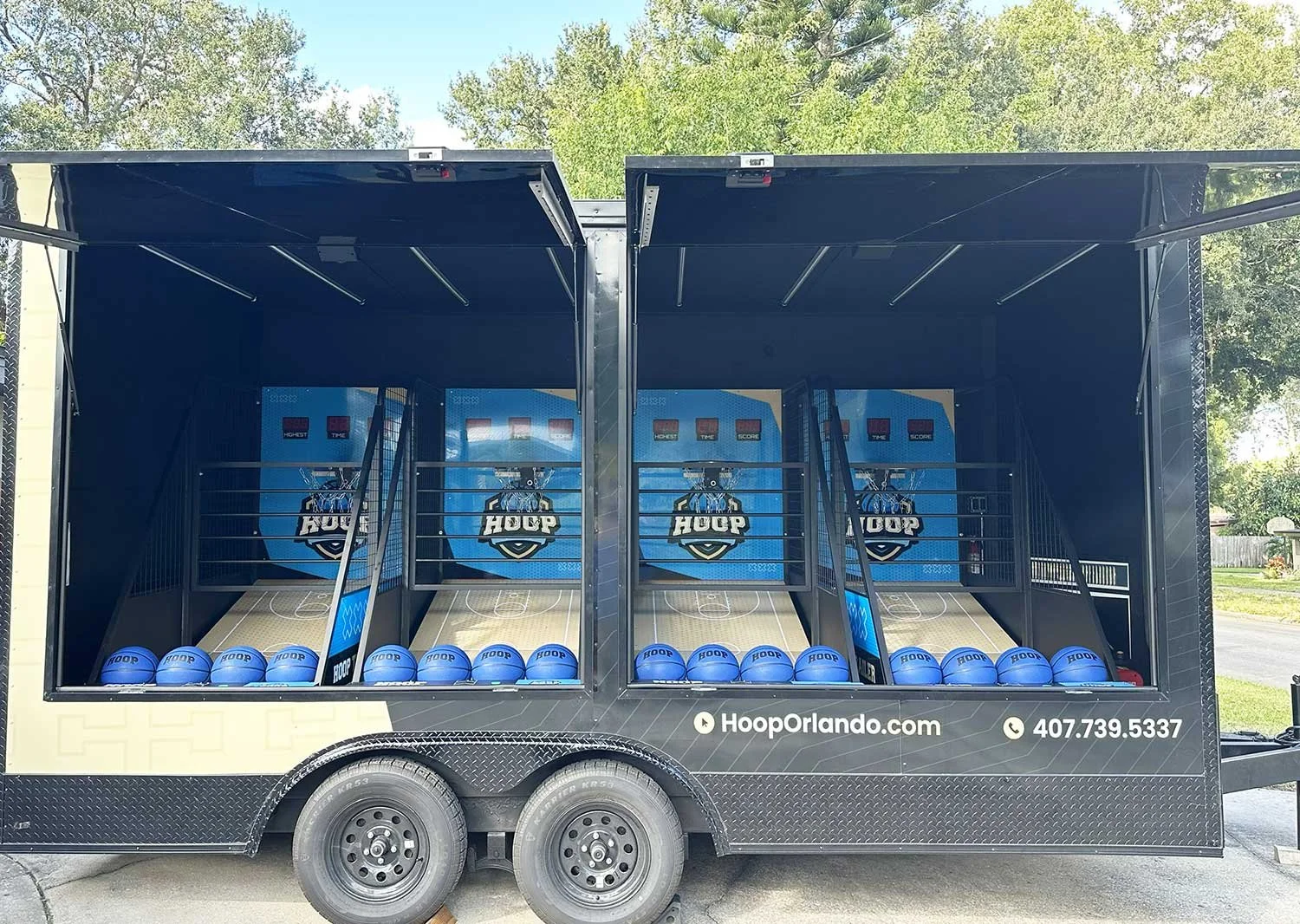 View of the Hoop Orlando Mobile Basketball trailer while open