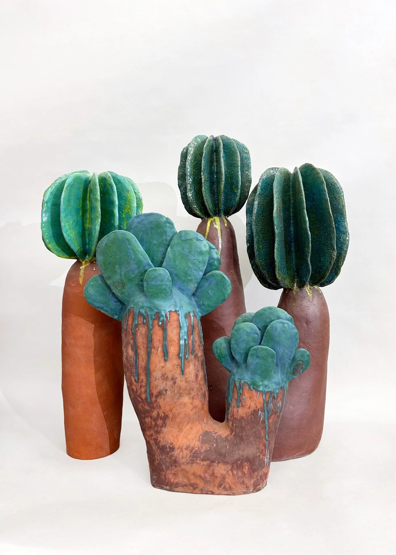  Flora #18, 2022 (left)  Glazed ceramic  19 inches high 