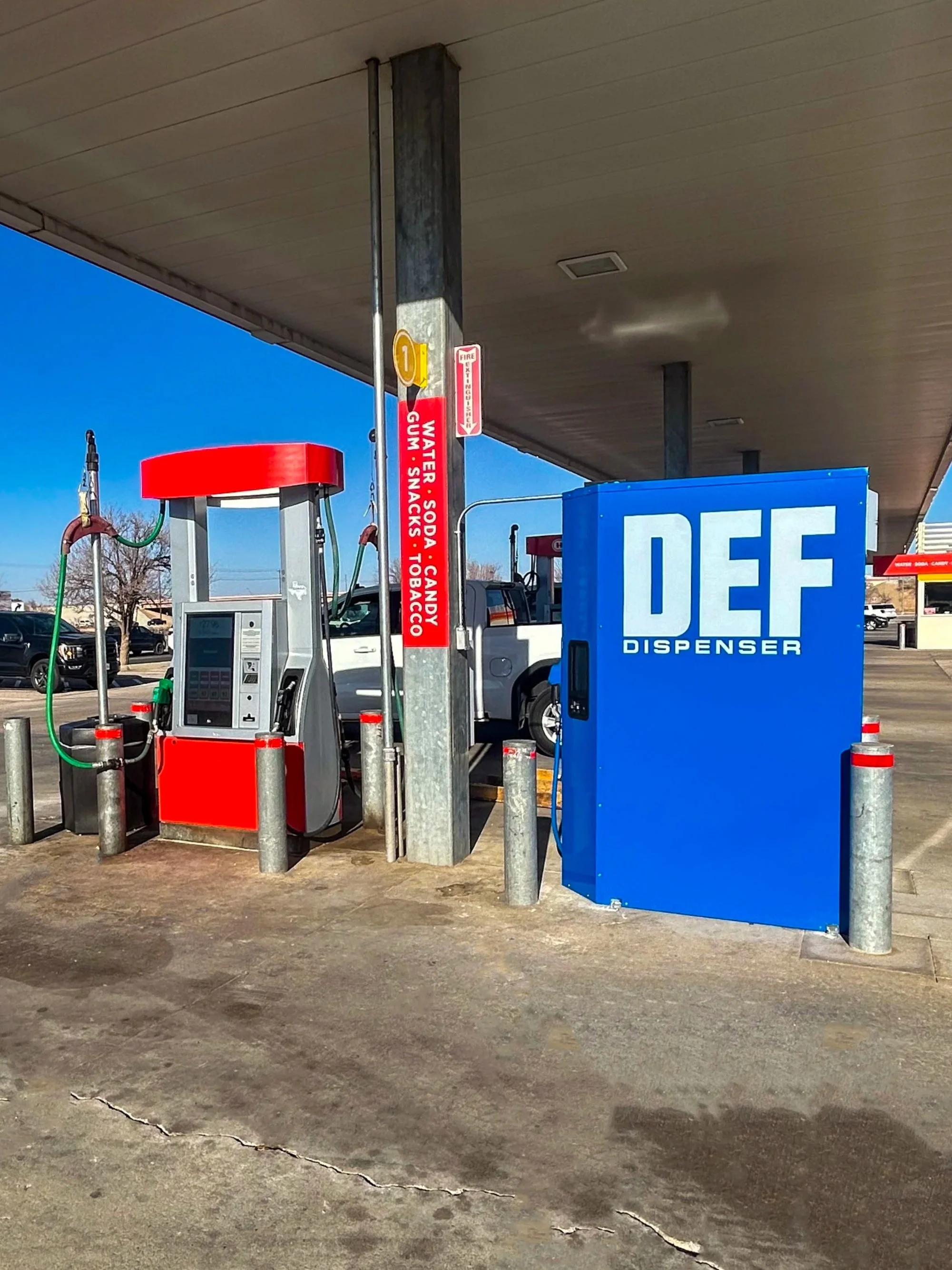 Sunlite above‑ground DEF dispenser at a fuel station