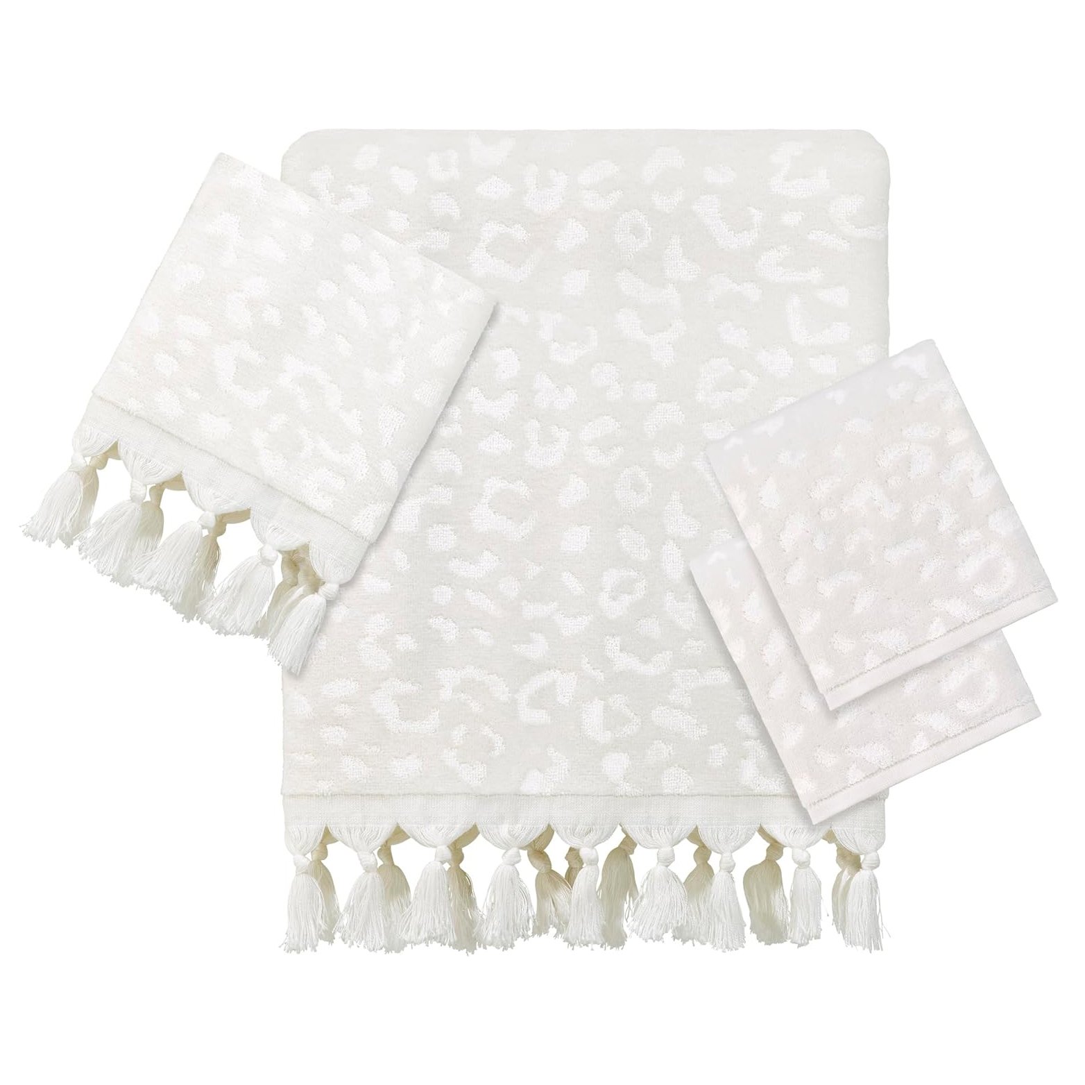 Set of white towels with leopard print and tassels, including two smaller matching towels and a larger towel.