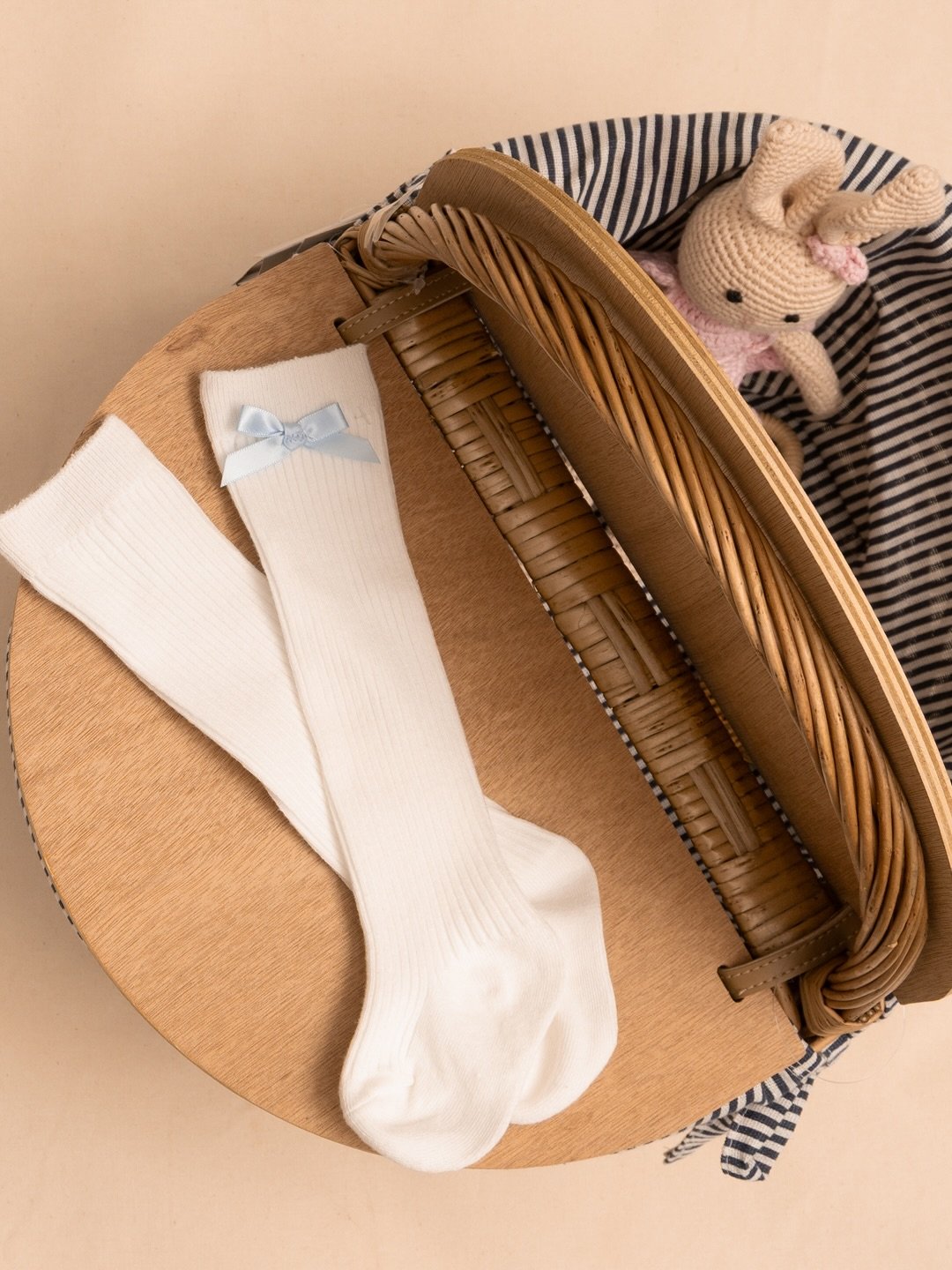 Easter morning essentials: Soft knits, little bows, and a basket by the door 🐰
