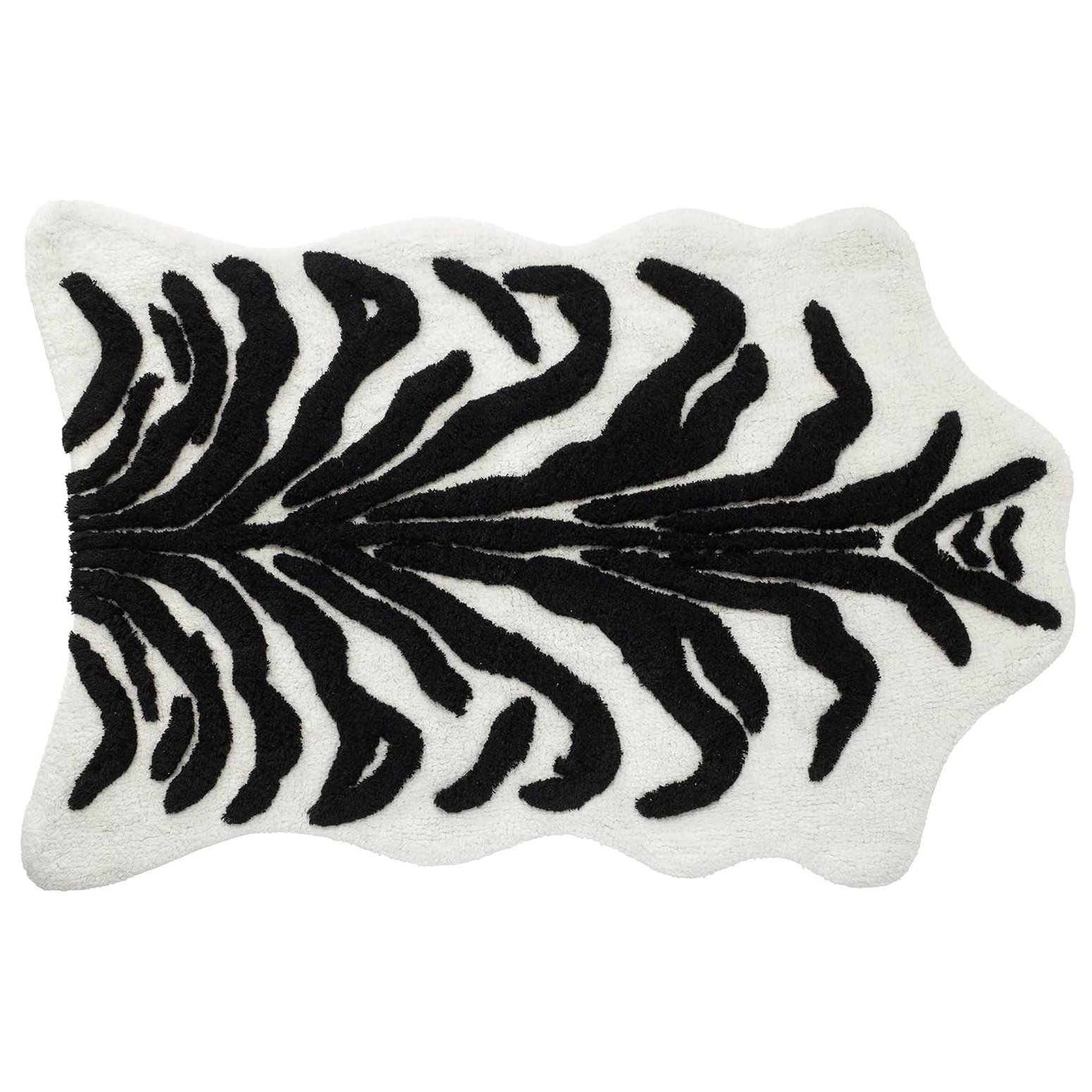 Black and white patterned rug with abstract zebra stripe design.