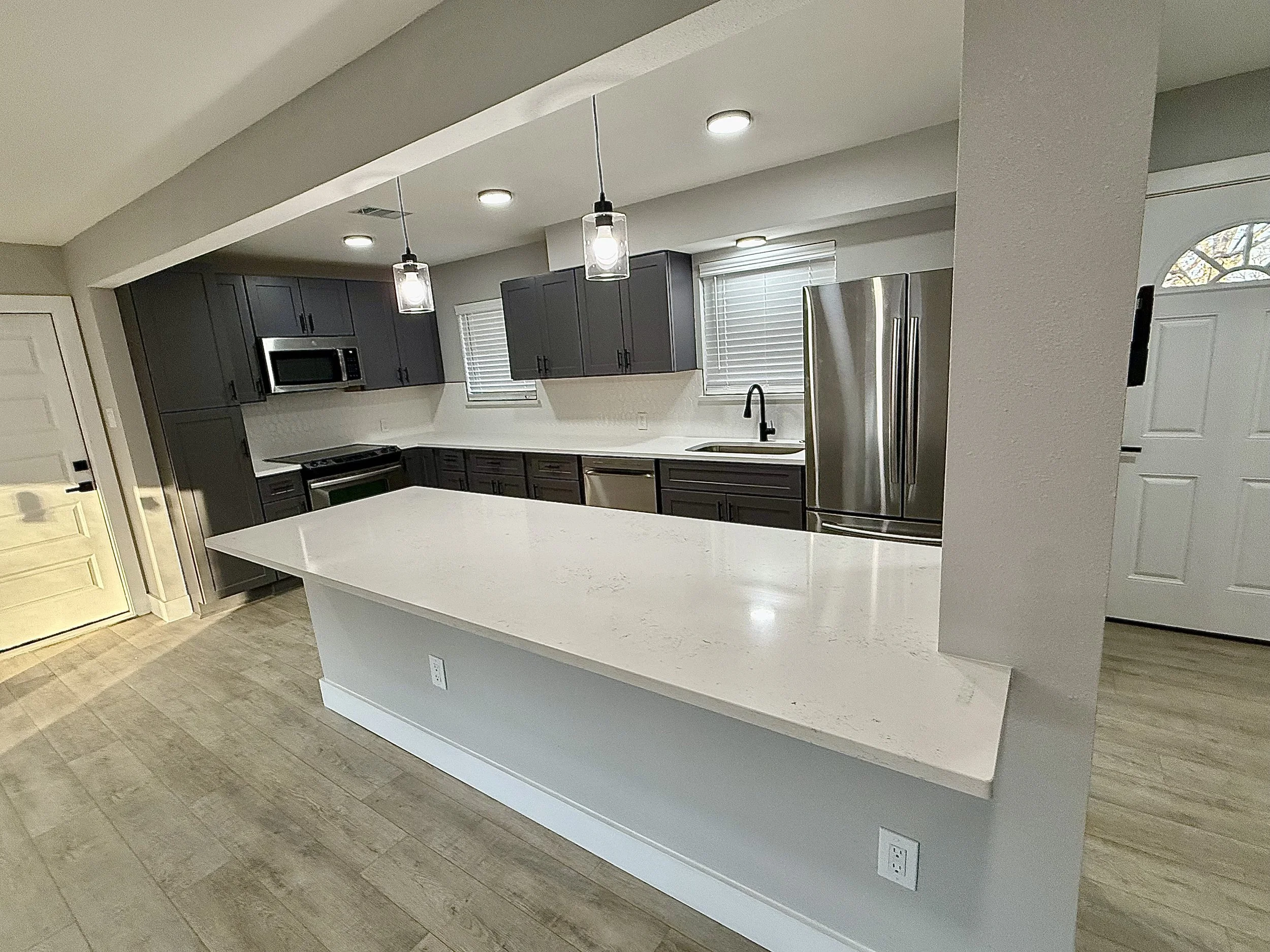 Modern Kitchen Remodel by SKĀL Construction Group LLC project photo
