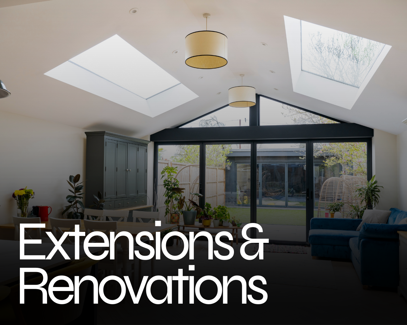 Living room with large skylights, glass sliding doors, and indoor plants, with text overlay reading 'Extensions & Renovations'.