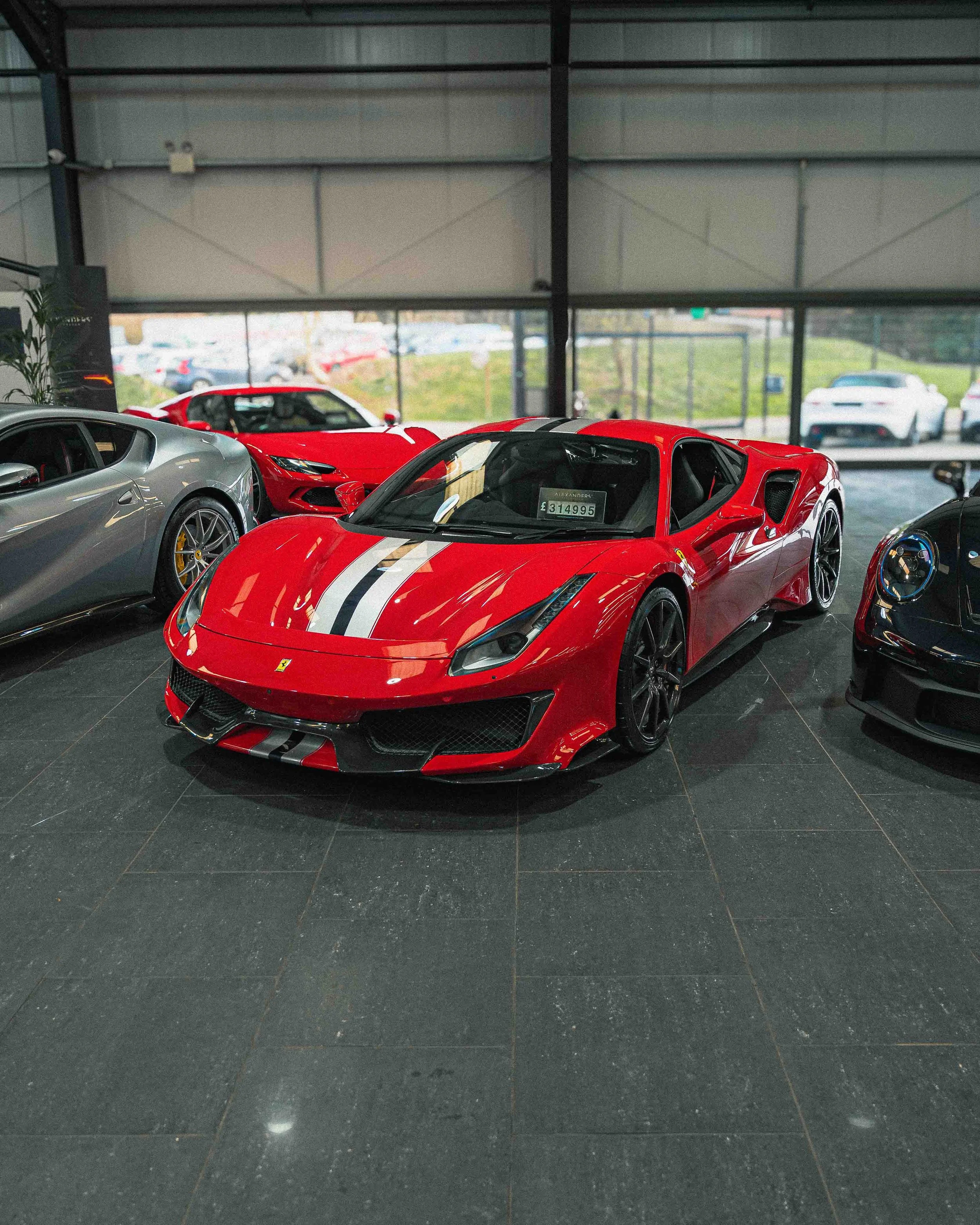 Ferrari Automotive photography inside a prestige car dealership
