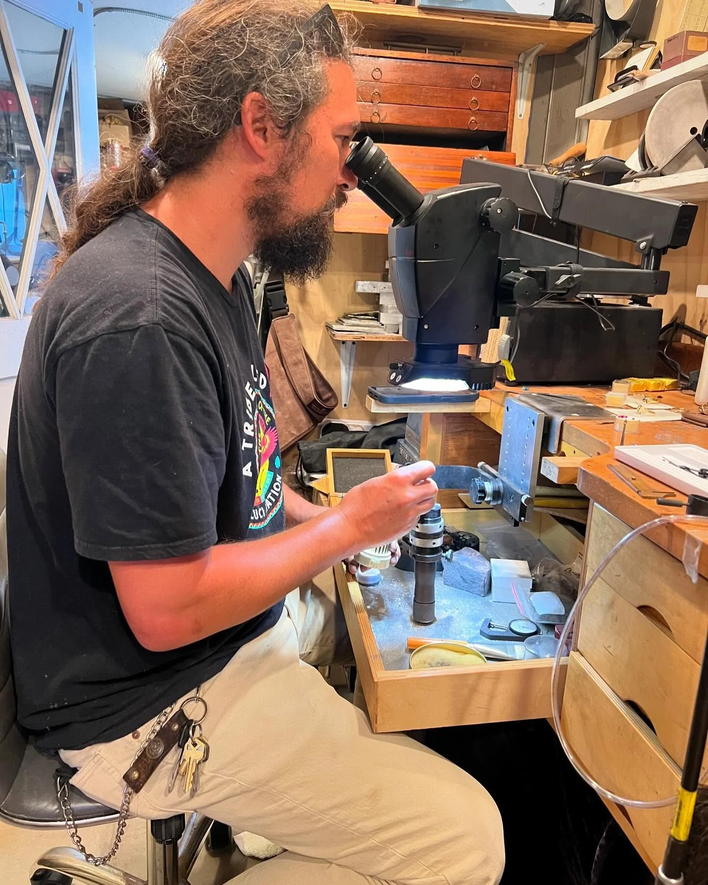 Back at the bench, setting Mozambique rubies in 14k solid gold. Zooming in on the details through the microscope while crafting one to size for a special couple&rsquo;s anniversary. 🔍✨💎 #JewelryMaking #Craftsmanship #RubyLove #Goldsmith