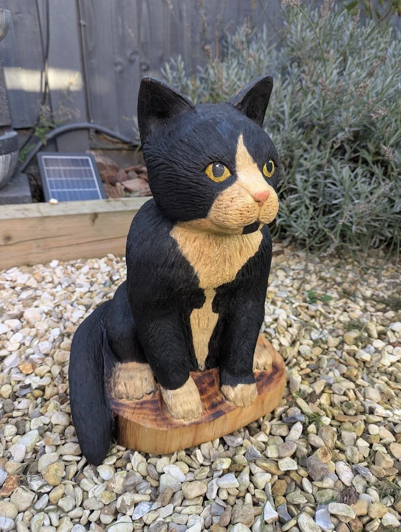 Cat Chainsaw Carvings