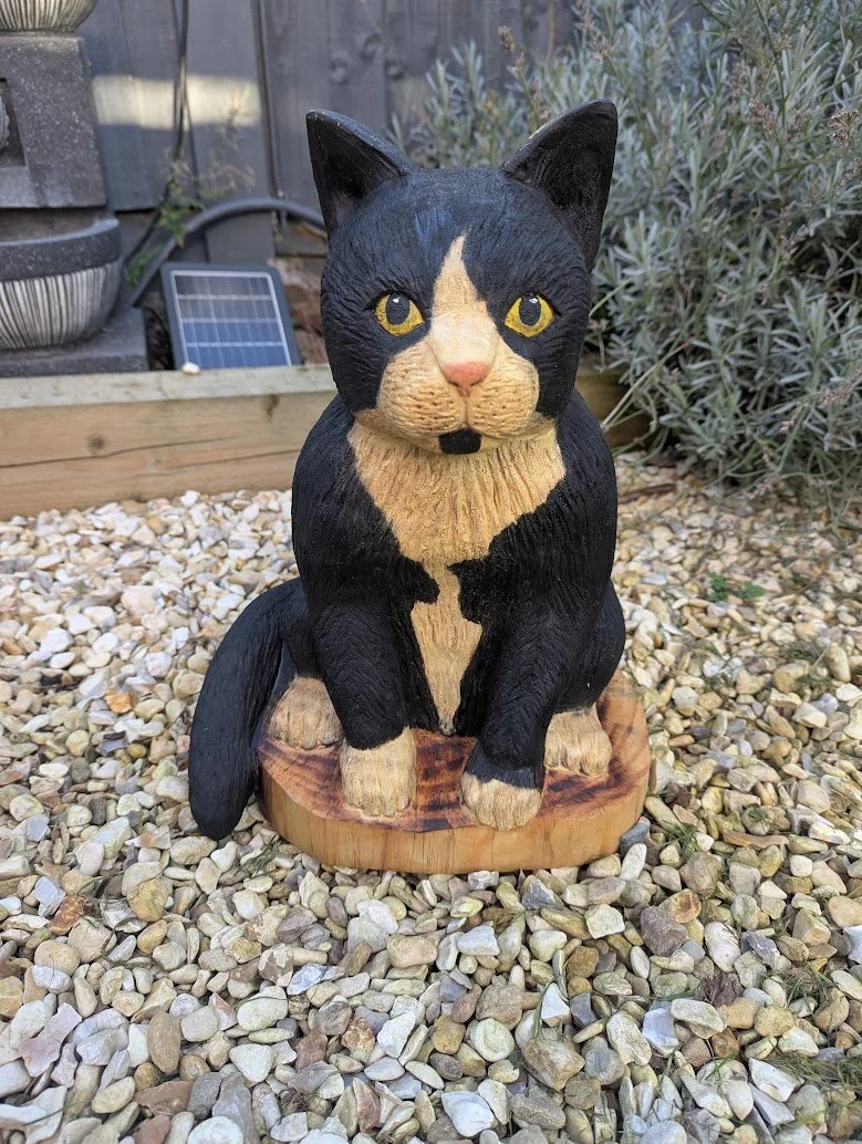 Cat chainsaw carving