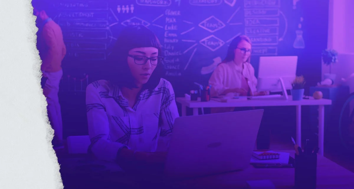 Designers working on their computers at their desks