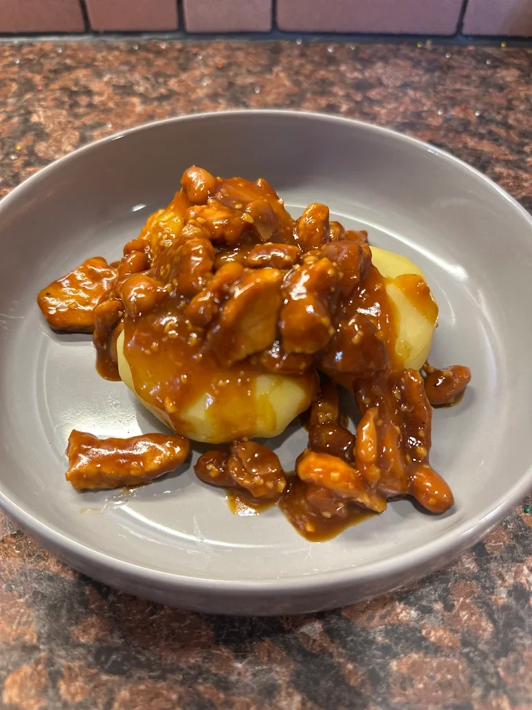 Sweet &amp; Smoky Pork and Beans Over Potatoes