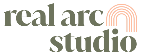 Text reading "real arc studio" with a stylized rainbow logo in shades of red and pink.