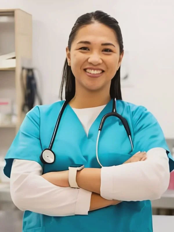 Female healthcare professional wearing high-quality medical scrubs provided by leading work uniform suppliers.