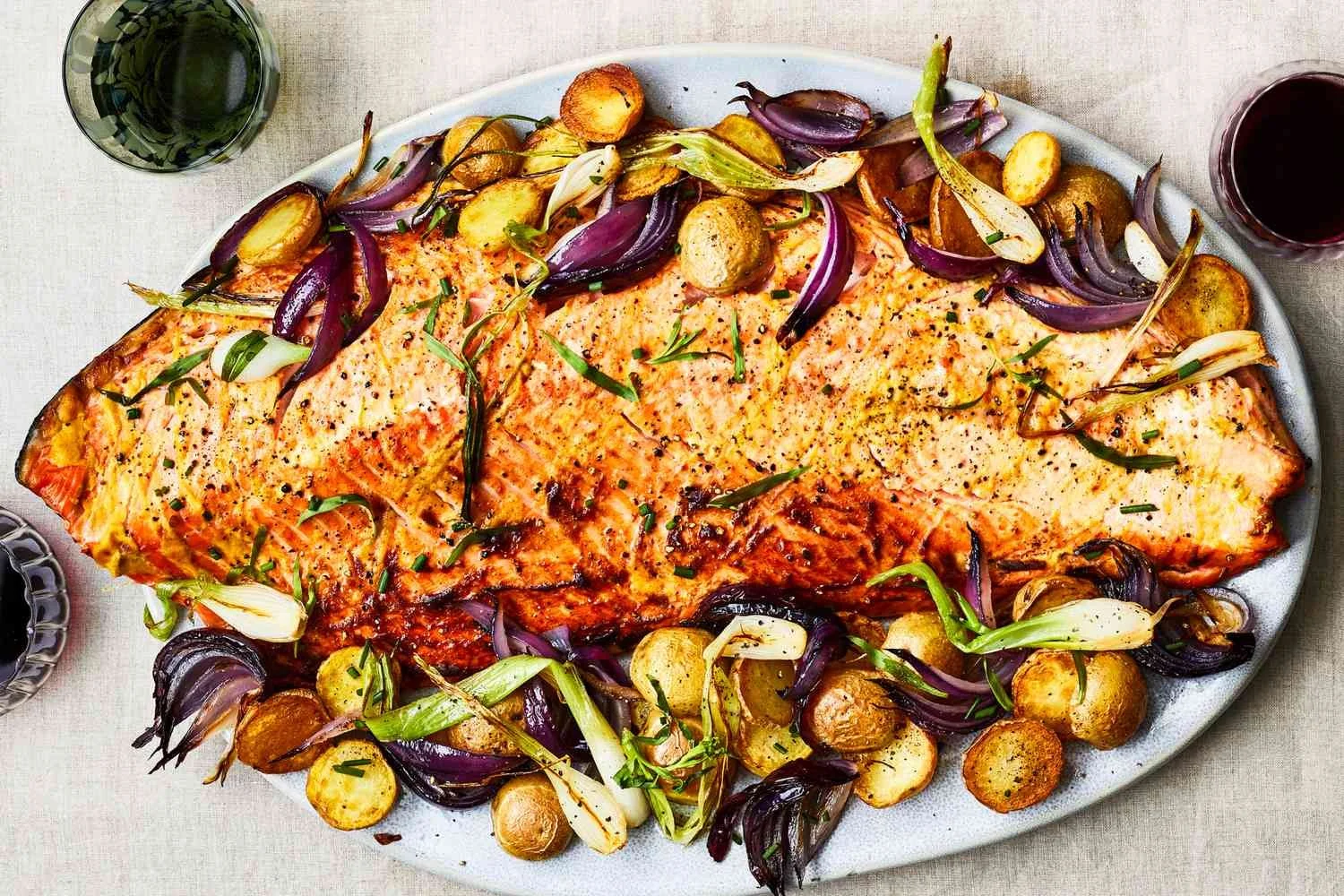 sizzling-garlic-salmon-with-sheet-pan-potatoes-FT-RECIPE0422-eb5c9402ddd44d81aa471177c60bcfaa.jpg