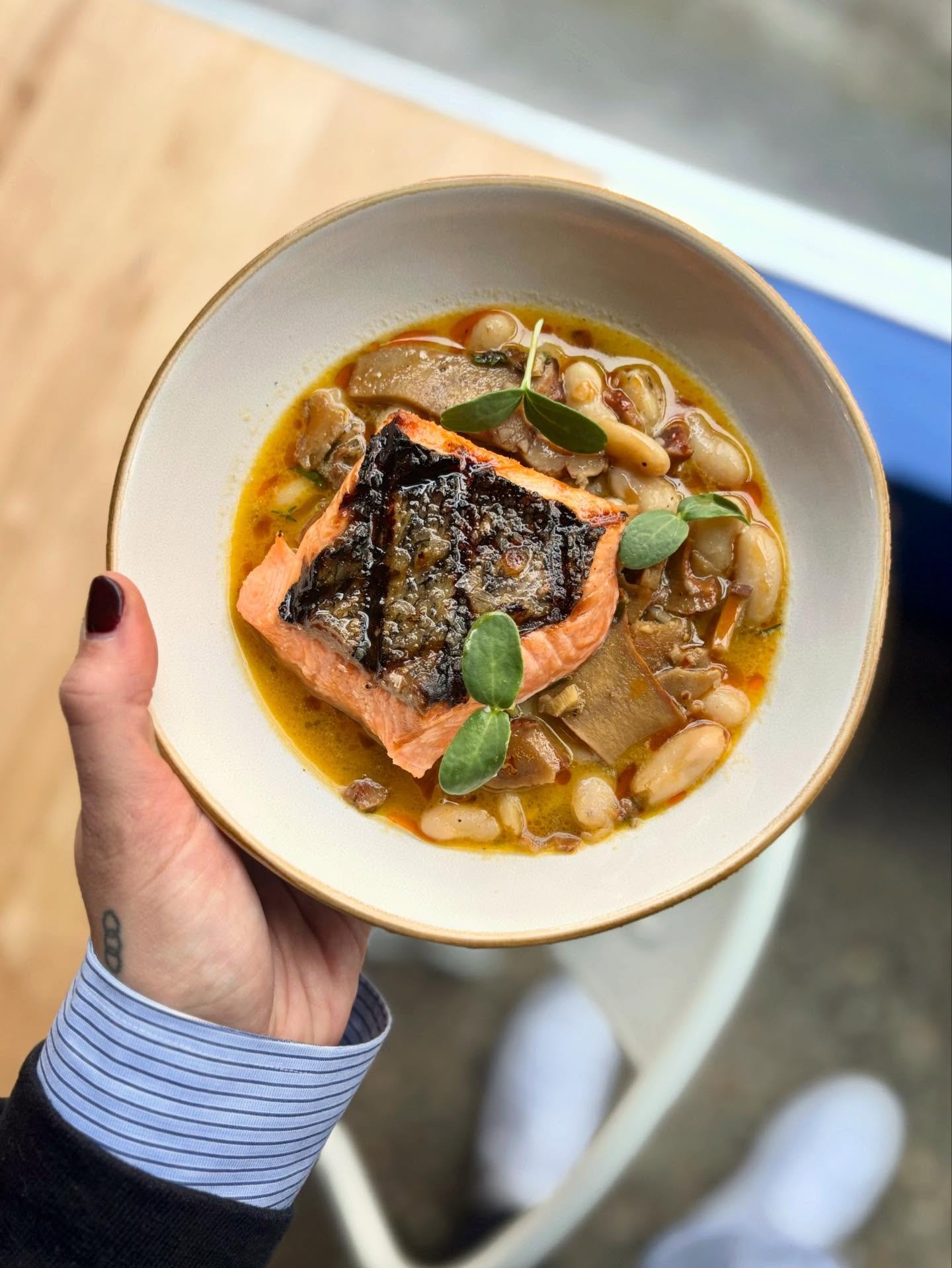 Grilled King Salmon 🎣 braised lobster mushrooms, cannellini beans, butter broth. 

A bowl of nourishing comfort for these chilly days. On the menu in Queen Anne! 

#kingsalmon #queenanneseattle #seattlerestaurants #comfortfood #soupseason