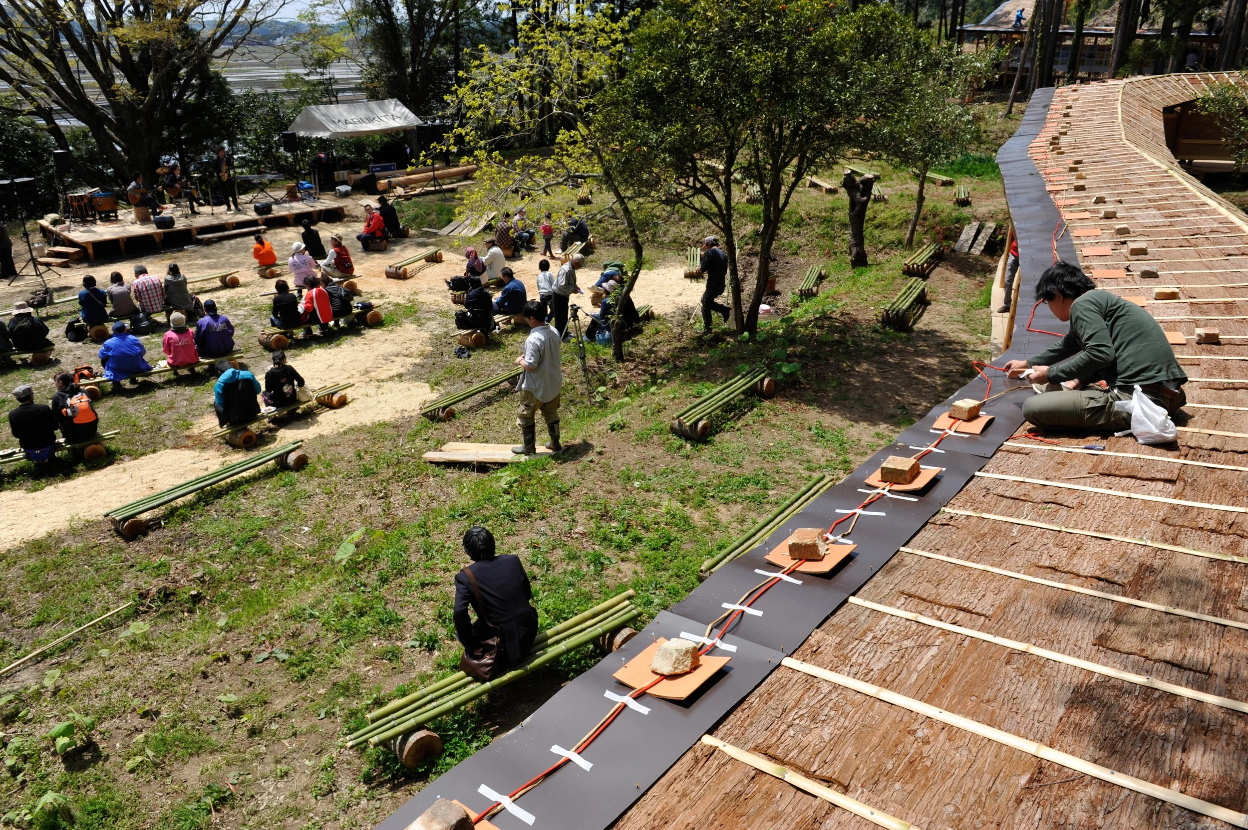  The making of Editions for SMoCA on 99 terracotta tiles during the inauguration of SMoCA, 2013. Photo by Kazuo Ono, courtesy Cai Studio 