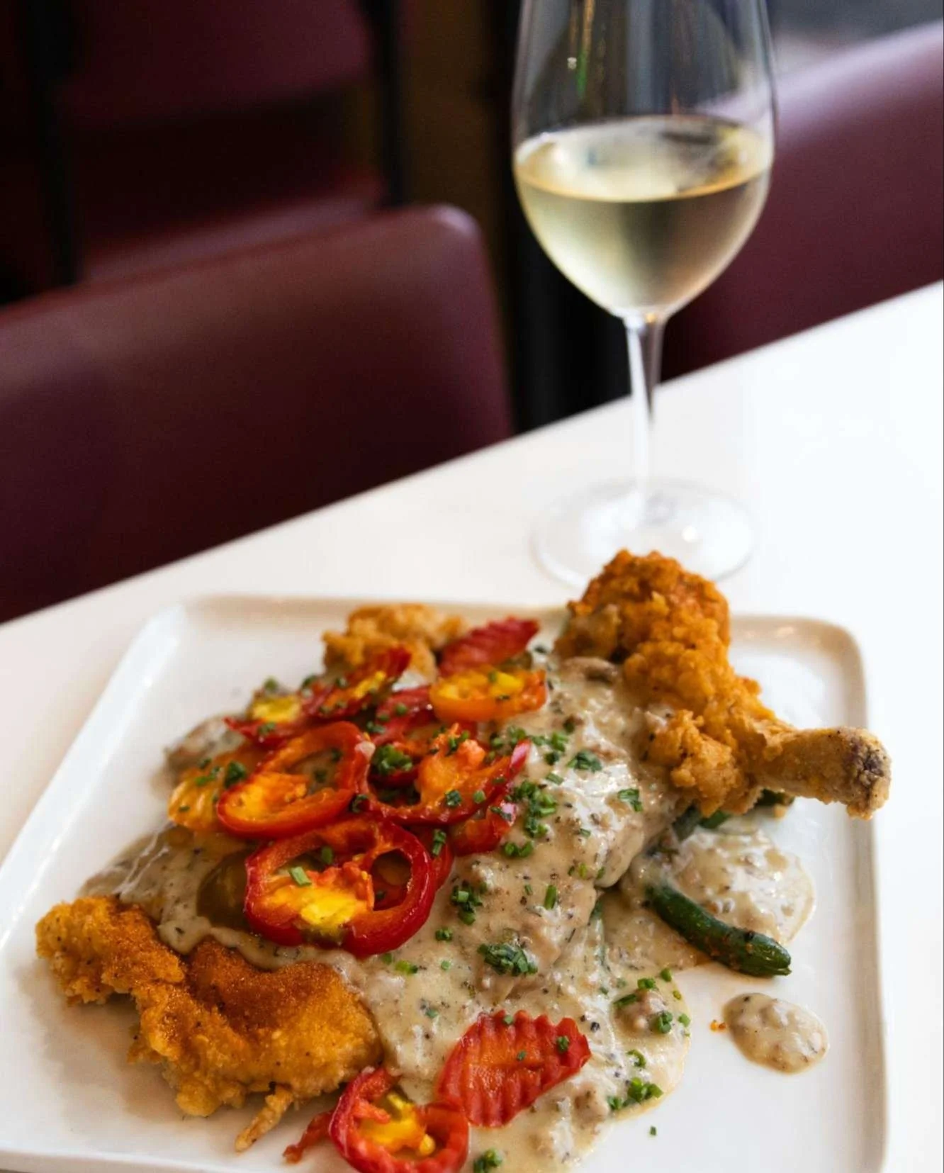 National Comfort Food Day = excuse to eat something crispy, creamy, and completely irresistible 😏

Smothered Pork Chop | chicken fried pork chop, cherry peppers, garlic whipped potatoes, cajun green beans, sausage gravy