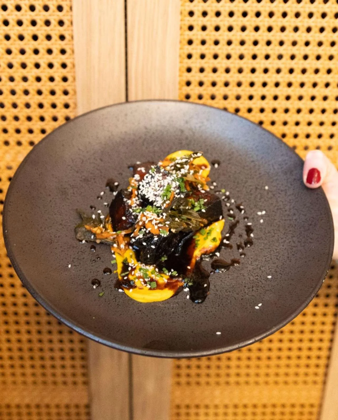 Proof that some of the best bites come on small plates.

Pork Belly | soy molasses glazed, curried carrot puree, kimchi collards, sesame seeds