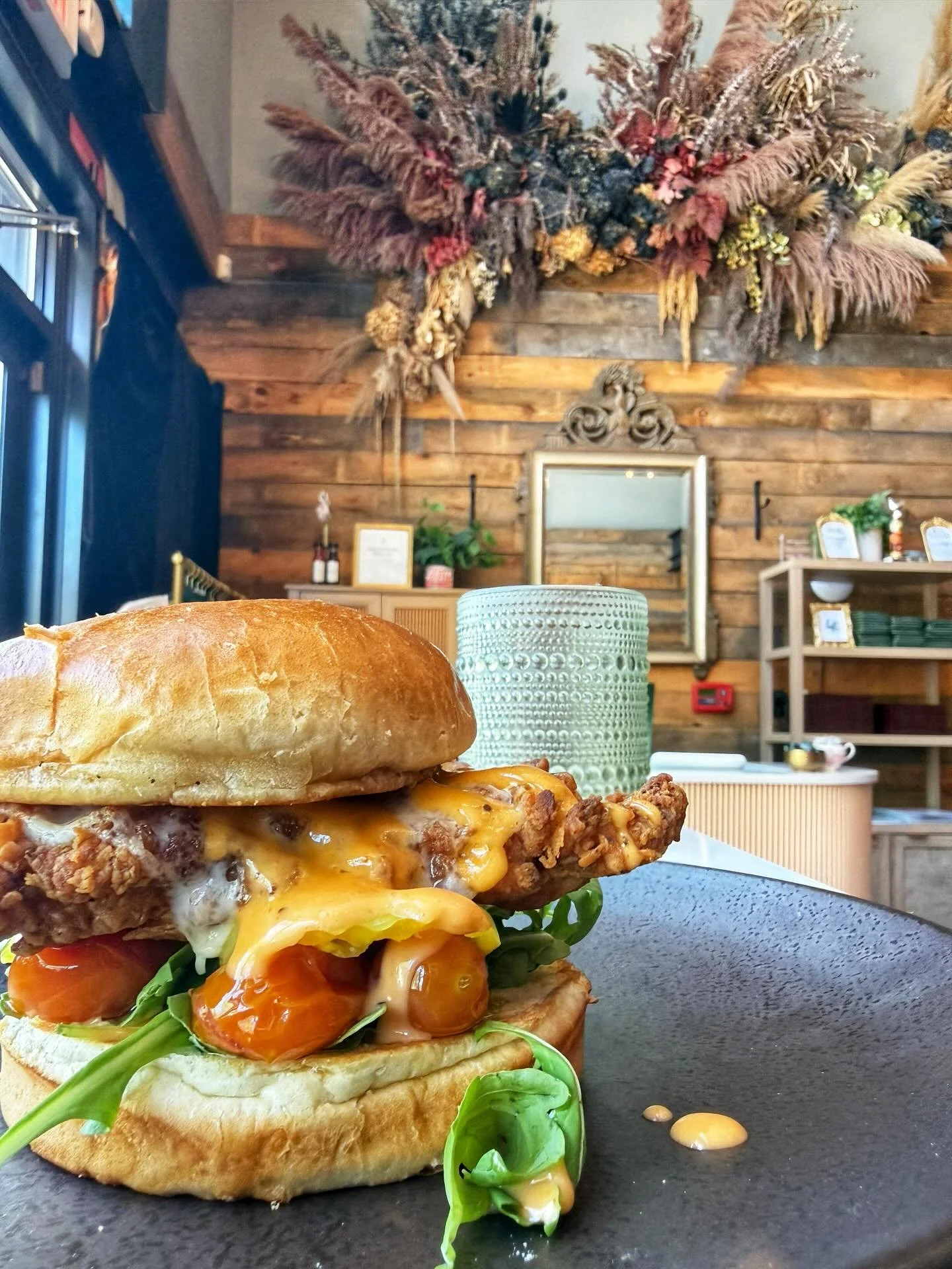 If you needed a sign to treat yourself&hellip; this is it.
Fried chicken, but make it extra.

Fried chicken, brioche bun, spicy mayo, arugula, banana peppers, provolone, confit tomatoes.