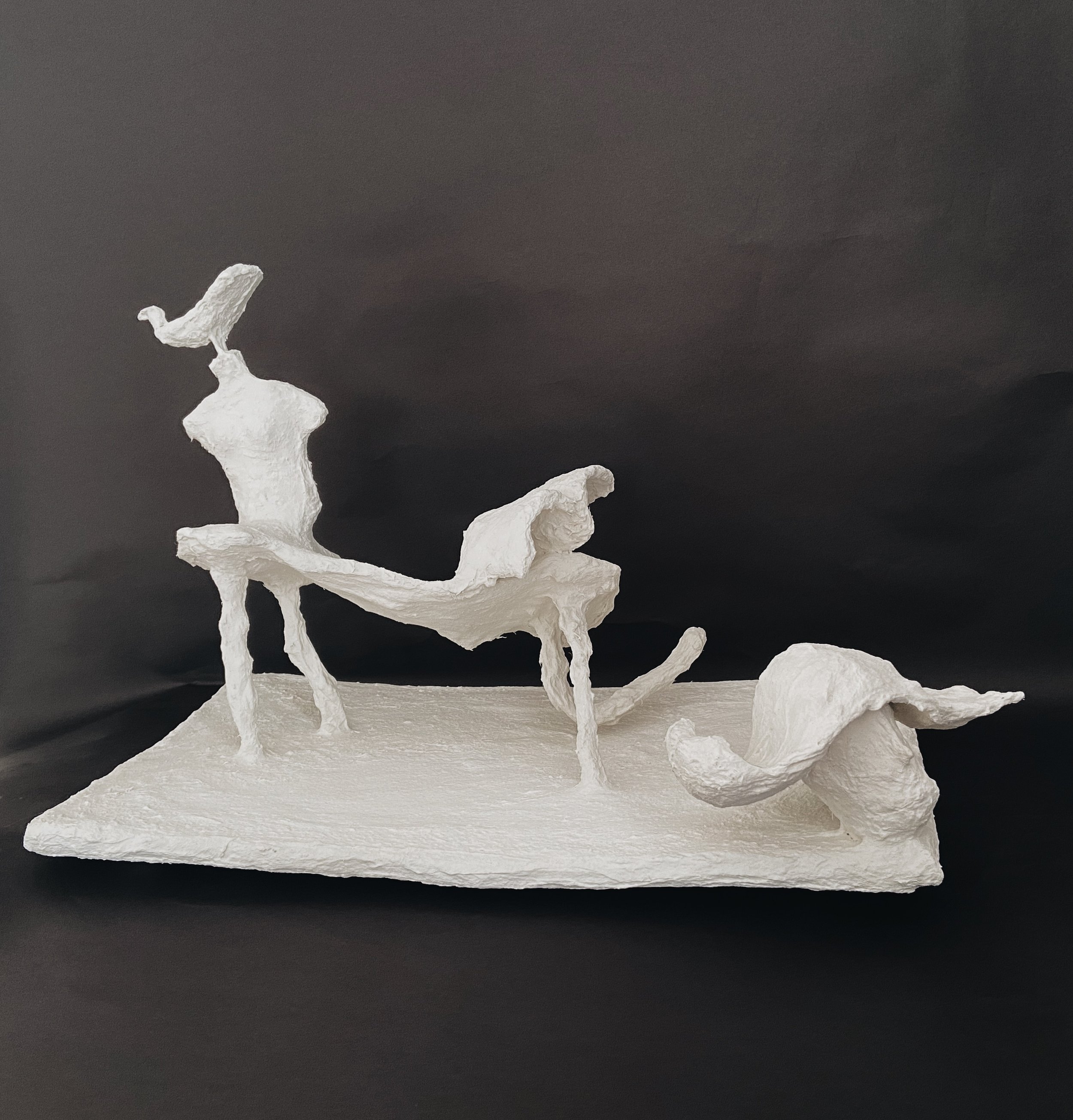 Jimena Montañéz, Looking away from a beast with book, 2025, Papier-mâché, 18 x 11 x 12 inches