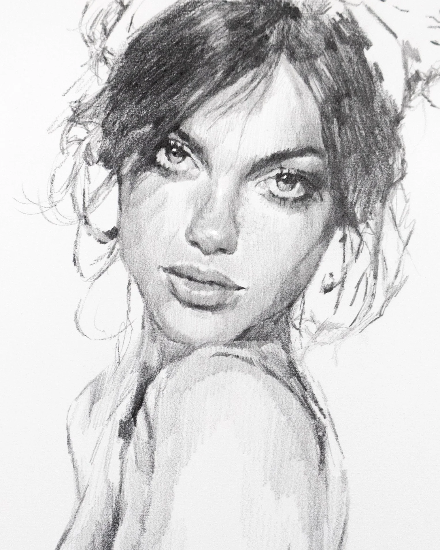 Black and white sketch of a woman's face with her shoulder visible, curly hair, expressive eyes, and slightly parted lips.