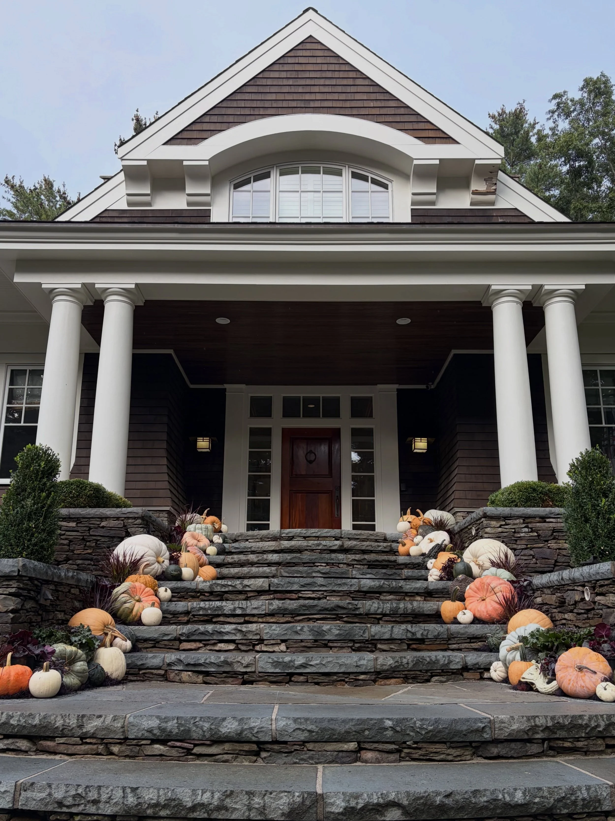 Embracing witchy vibes this season? Enjoy our take on the stunning install by @beforethedoorco. Pastel pumpkins with dark gourds and plum foliage set the tone. Grab your black cat and broomstick and you&rsquo;re ready to go.