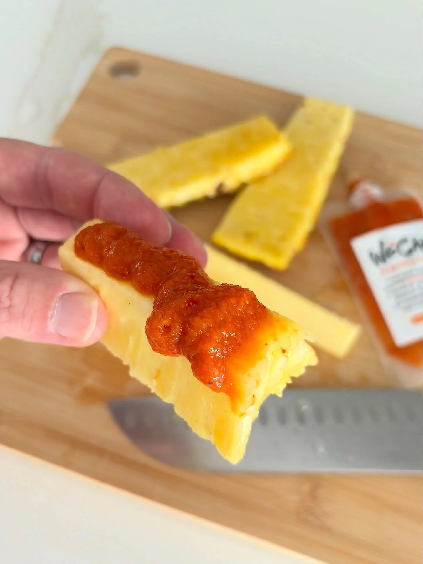 Keeping it simple for breakfast today: Fresh-cut pineapple topped with Spicy WeChi 🍍🔥 

Kinda like a probiotic, Korean version of the Fruit Carts we used to frequent all over LA&hellip; Instead of Taj&iacute;n y lim&oacute;n, it&rsquo;s gochugaru, 