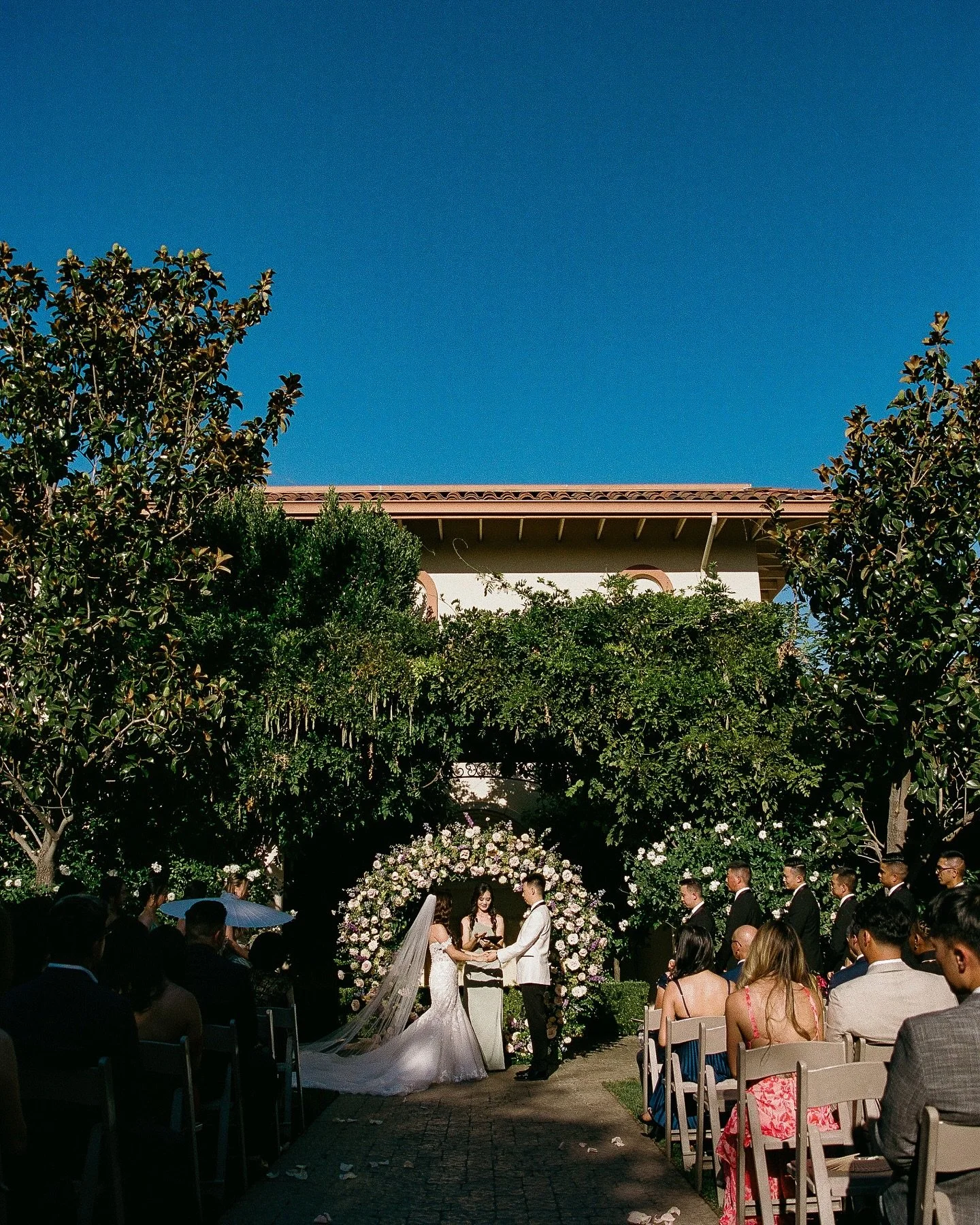 Getting Bond vibes from Sterling &amp; Sophia&rsquo;s wedding with Casa Real&rsquo;s Mediterranean-style architecture and impeccable style. Shot on Kodak Portra 35mm film.

-VENDOR TEAM-
Venue: @casarealevents
Photo: @ericle.photos @inspiredbystudio
