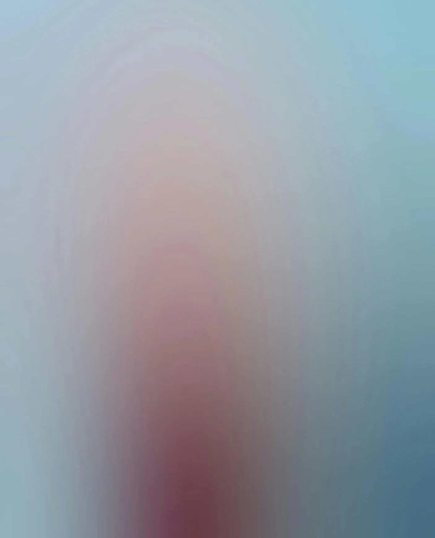 Blurred abstract background with soft pastel colors of blue, pink, and purple.