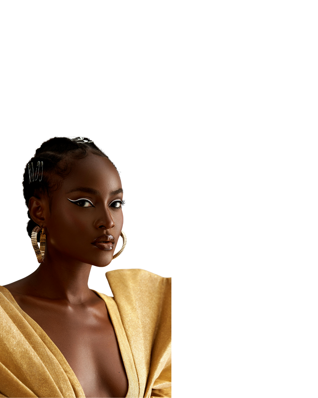 Portrait of a woman with dark skin, styled hair with hairpins, bold winged eyeliner, large hoop earrings, wearing a shiny gold dress with structured shoulders, against a plain white background.