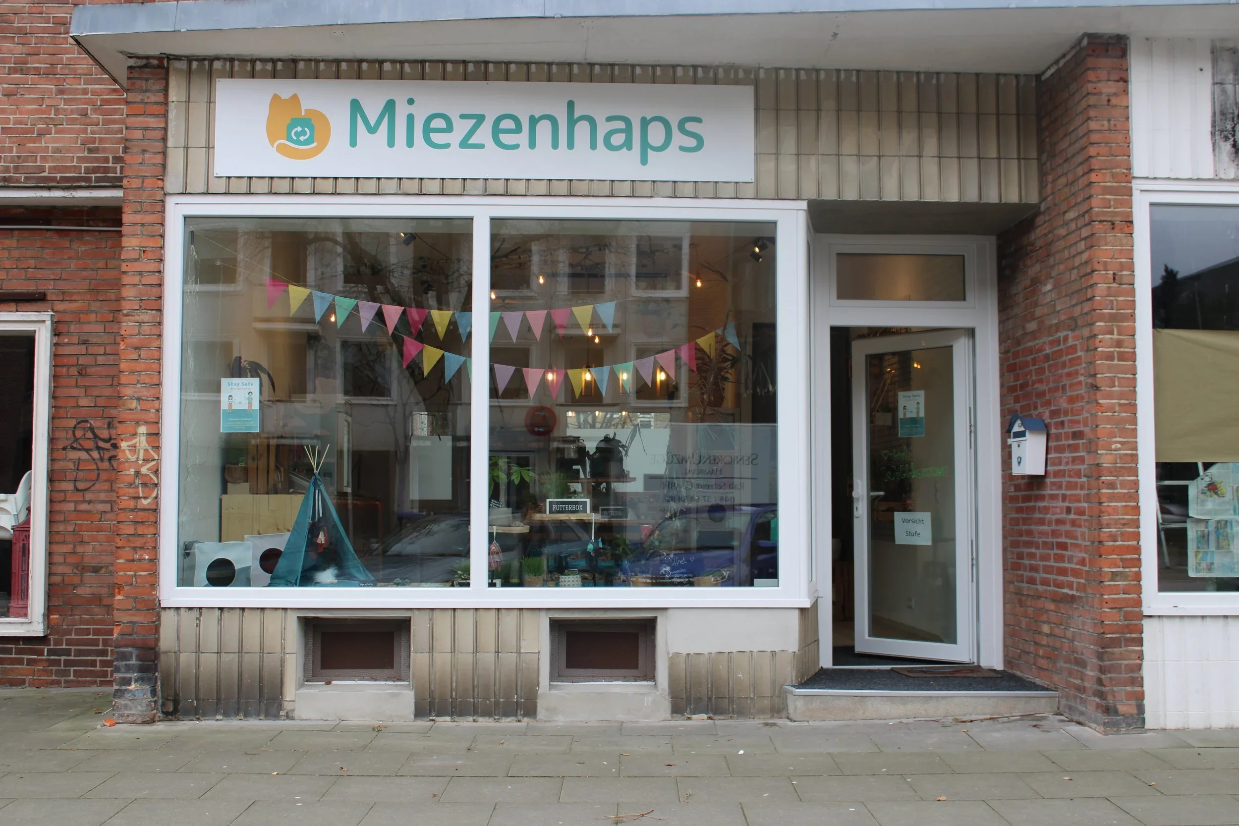 Miezenhaps_Laden.webp