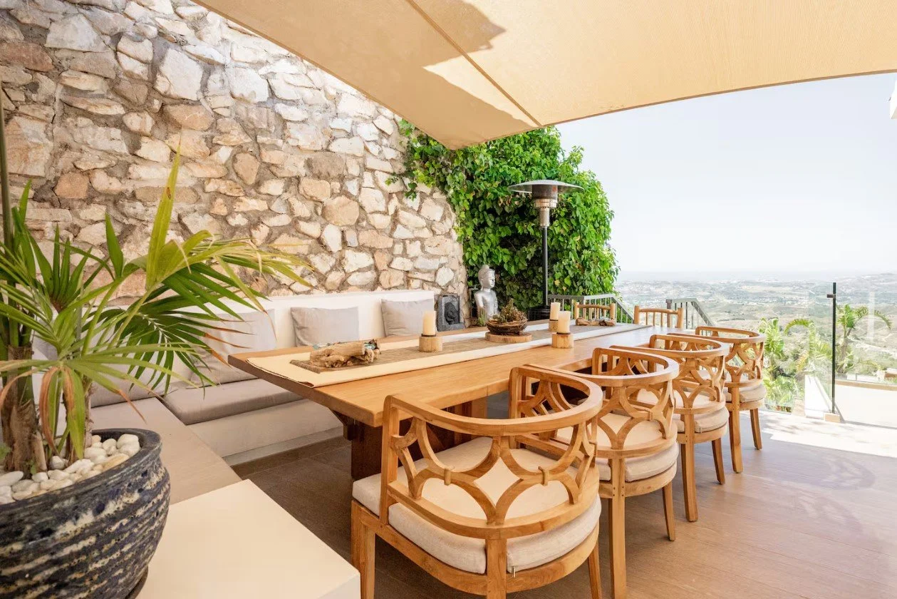 Outdoor patio dining area during the Maison Ophelia Marbella retreat