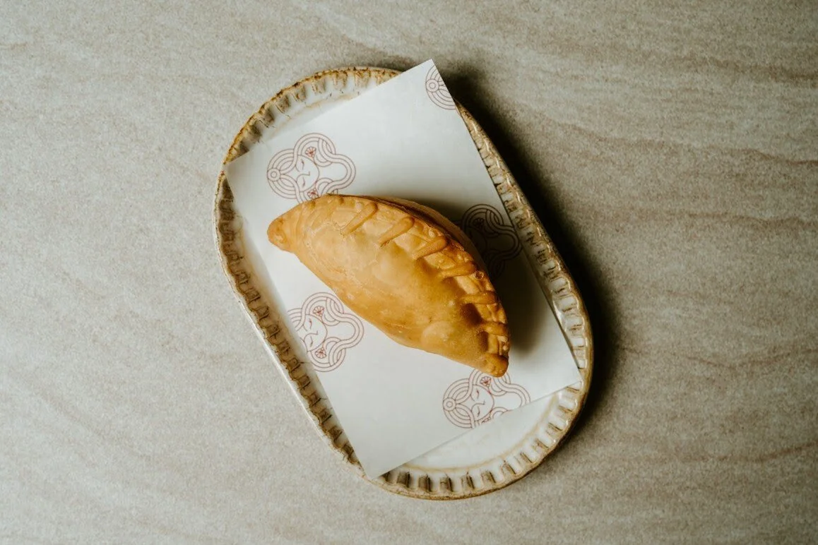 Empanada and Malbec $27 Combo
