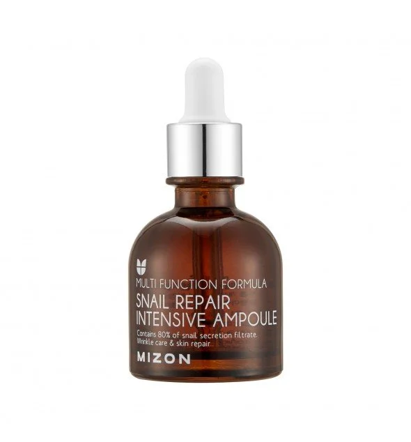 Mizon Snail Repair Intensive Ampoule sérum réparateur K-Beauty avec 80% de bave d'escargot pour régénérer la peau réduire les cicatrices et les rides.