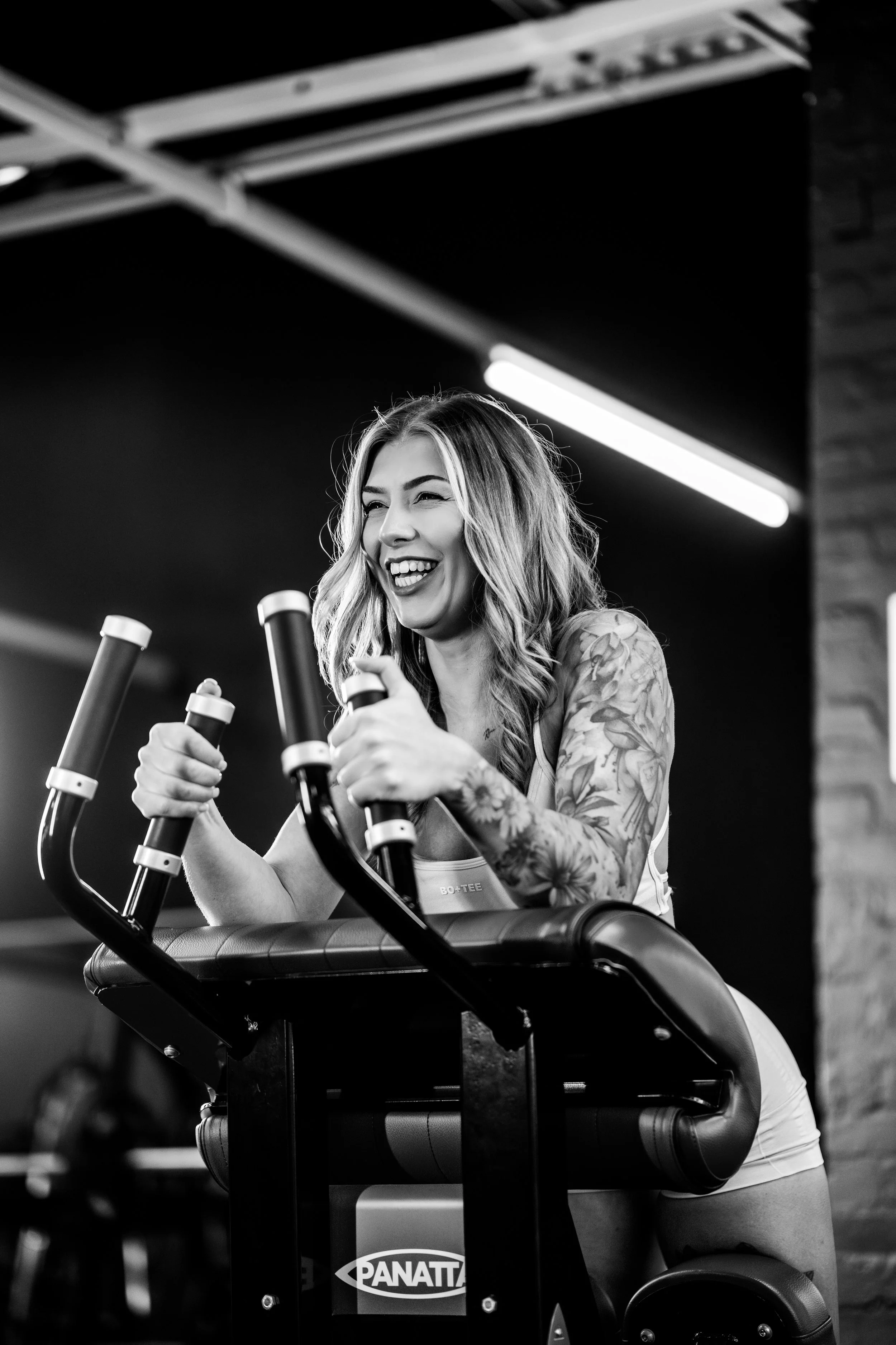 Naomi Shoot Empire hamstring curl smile BNW 2x3.JPG