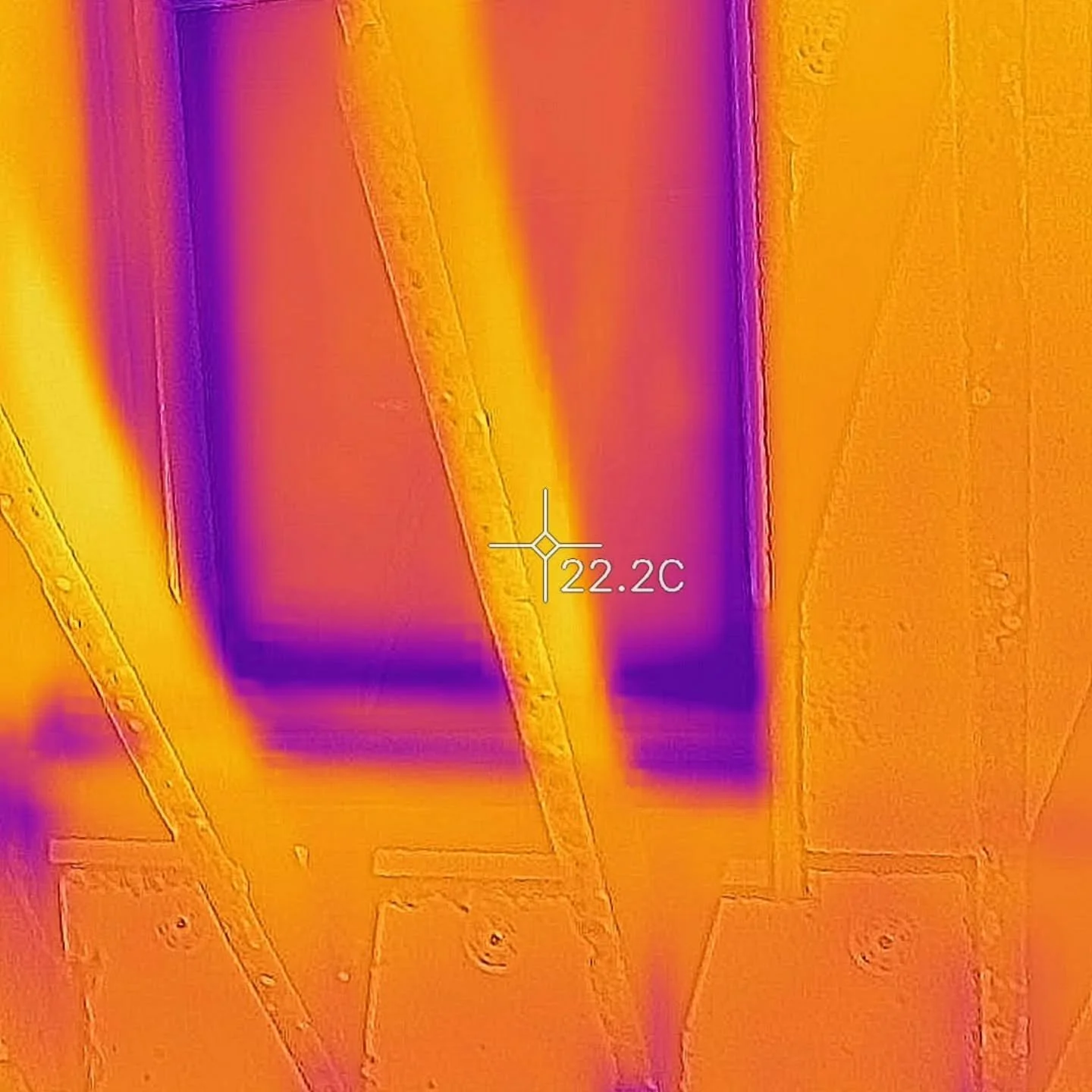 Thermal imaging allows us to see thermal bridges easily. In this example we see a velux window during a mid works inspection. Note also the thermal bridging occuring where the collar ties meet the insulation as cold travels through the wood to the in
