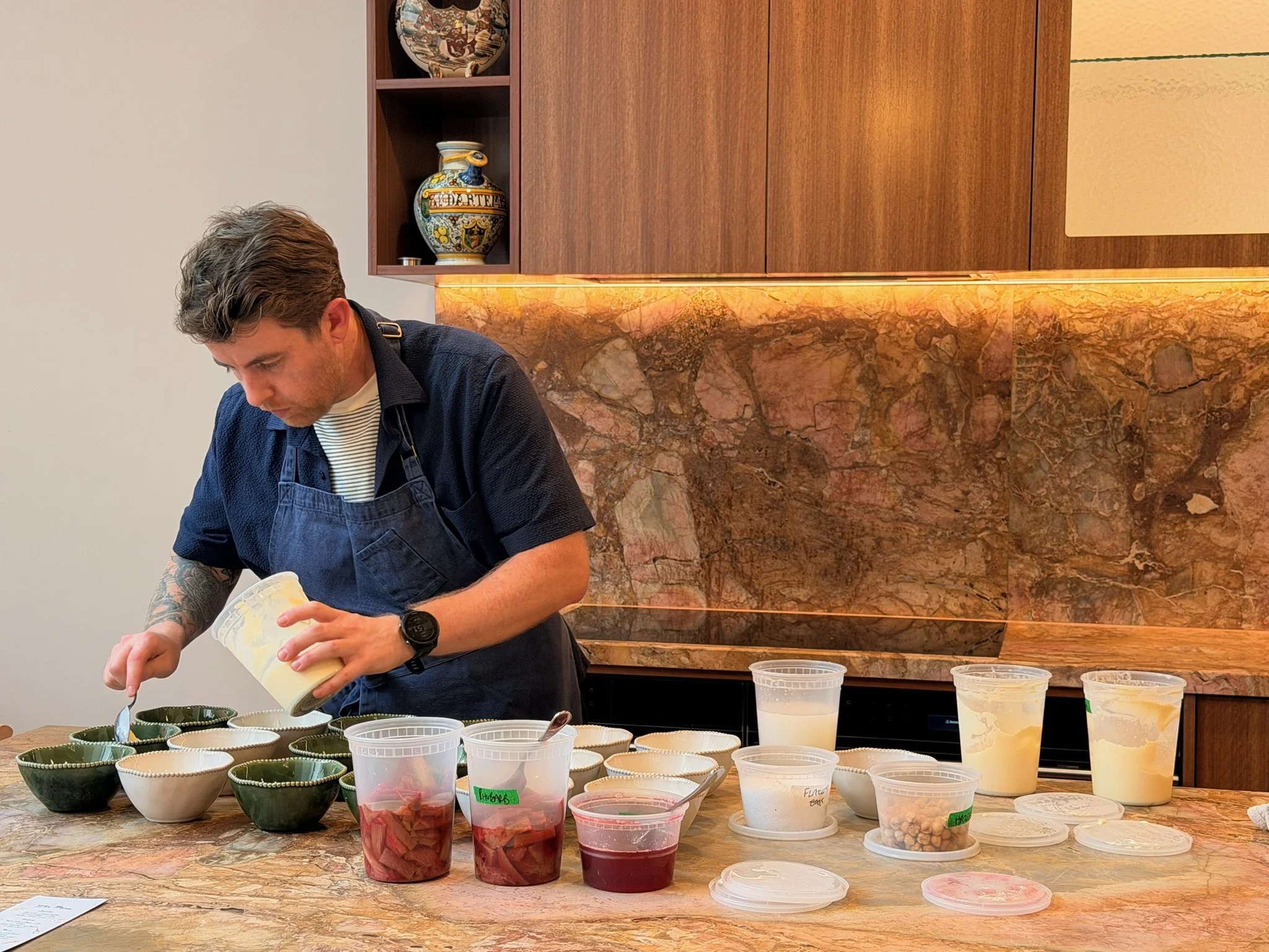 Chef Pete Townsend plating up dessert at a private event in South Melbourne. Private dining in-home experiences