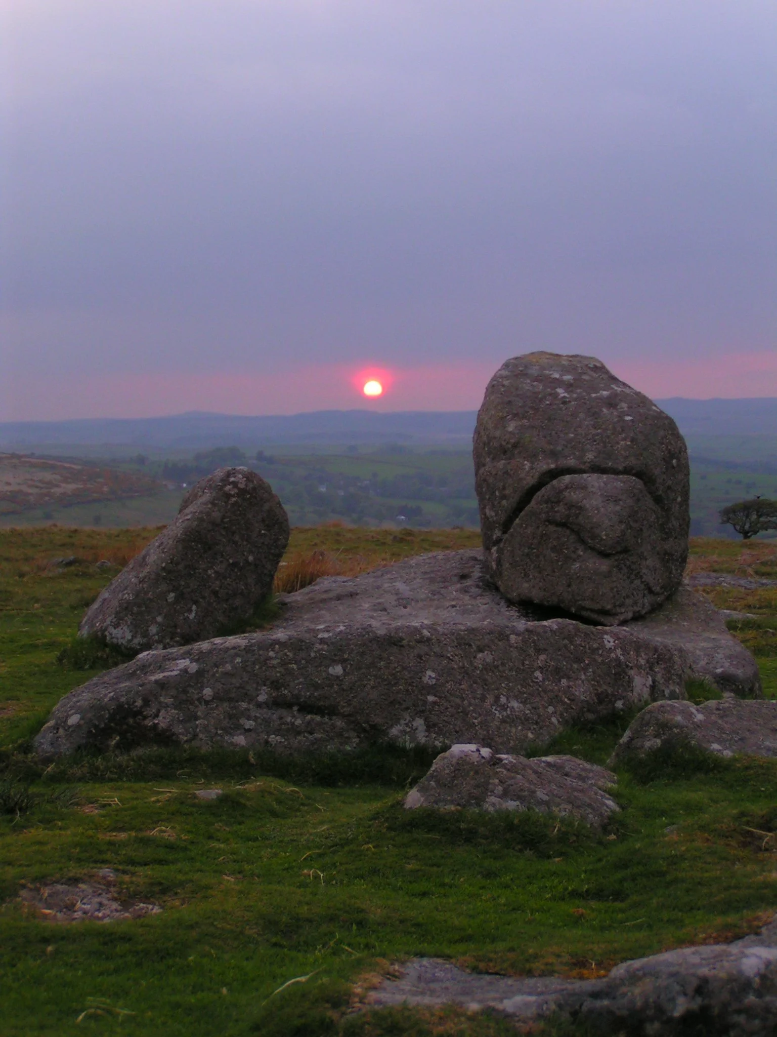 Sun setting on Combestone Tor,  Dartmoor