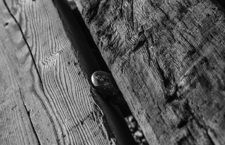 Oak Beams with pebbles on Hythe Beach, Kent