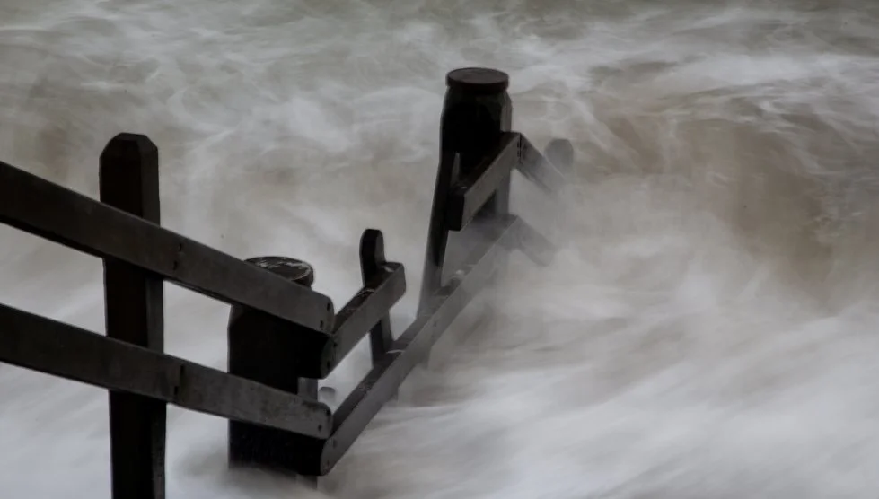 Long exposure, waves striking step rails 