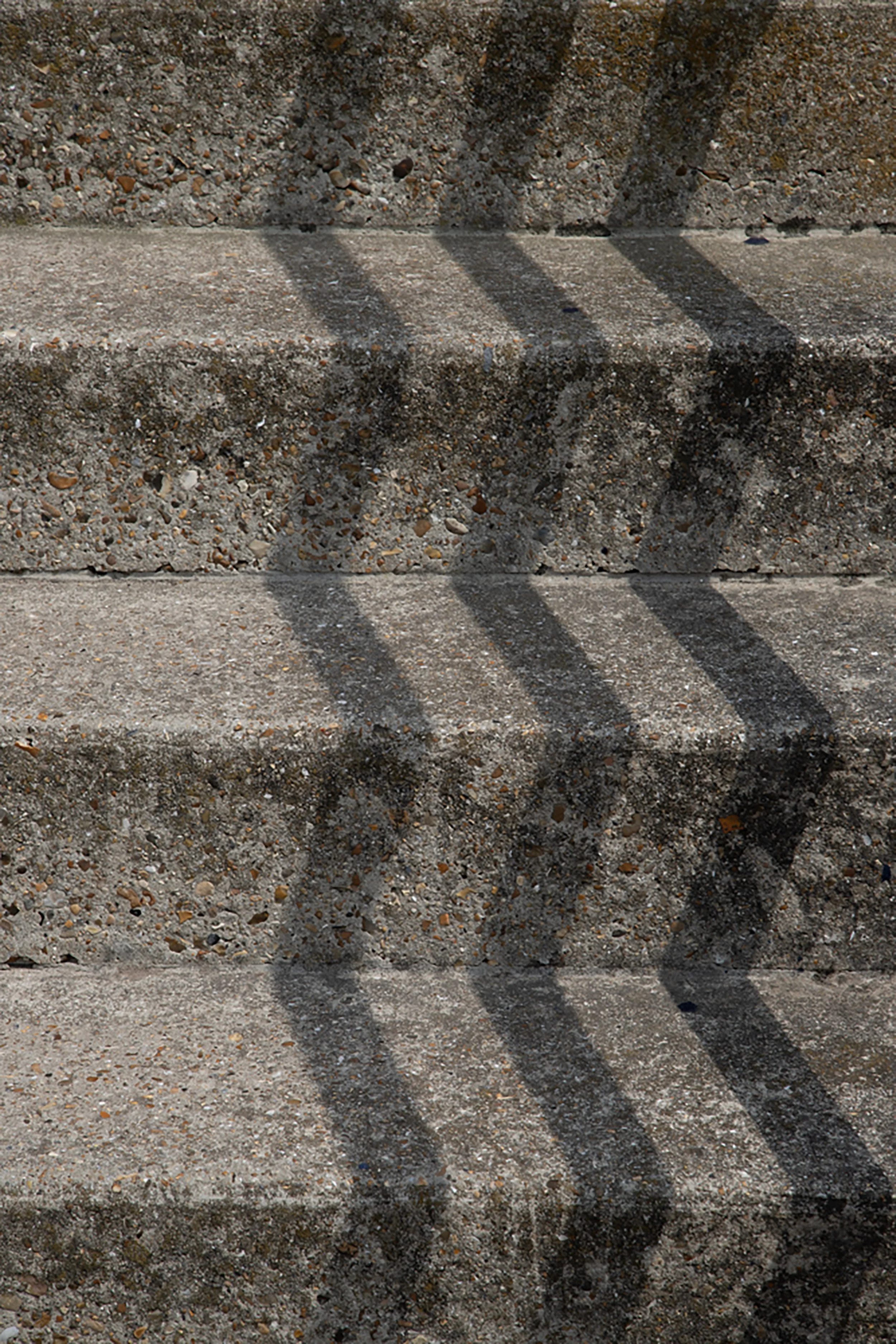 Shadows on concrete steps