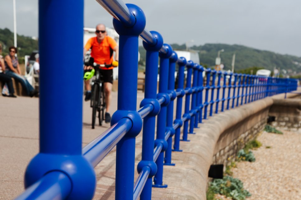 Cyclist on the Seafront at Hythe, Kent